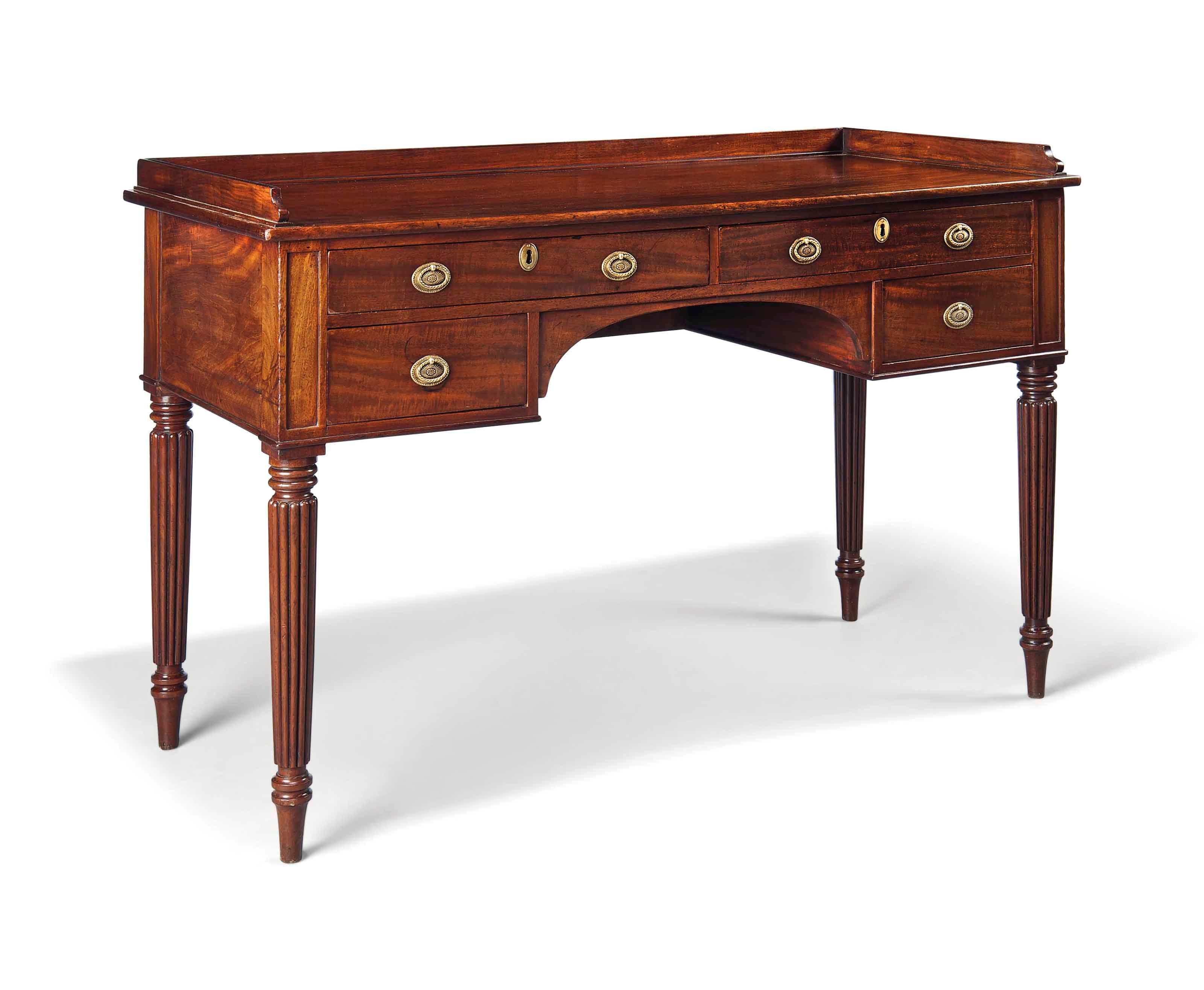 A GEORGE IV MAHOGANY WRITING TABLE