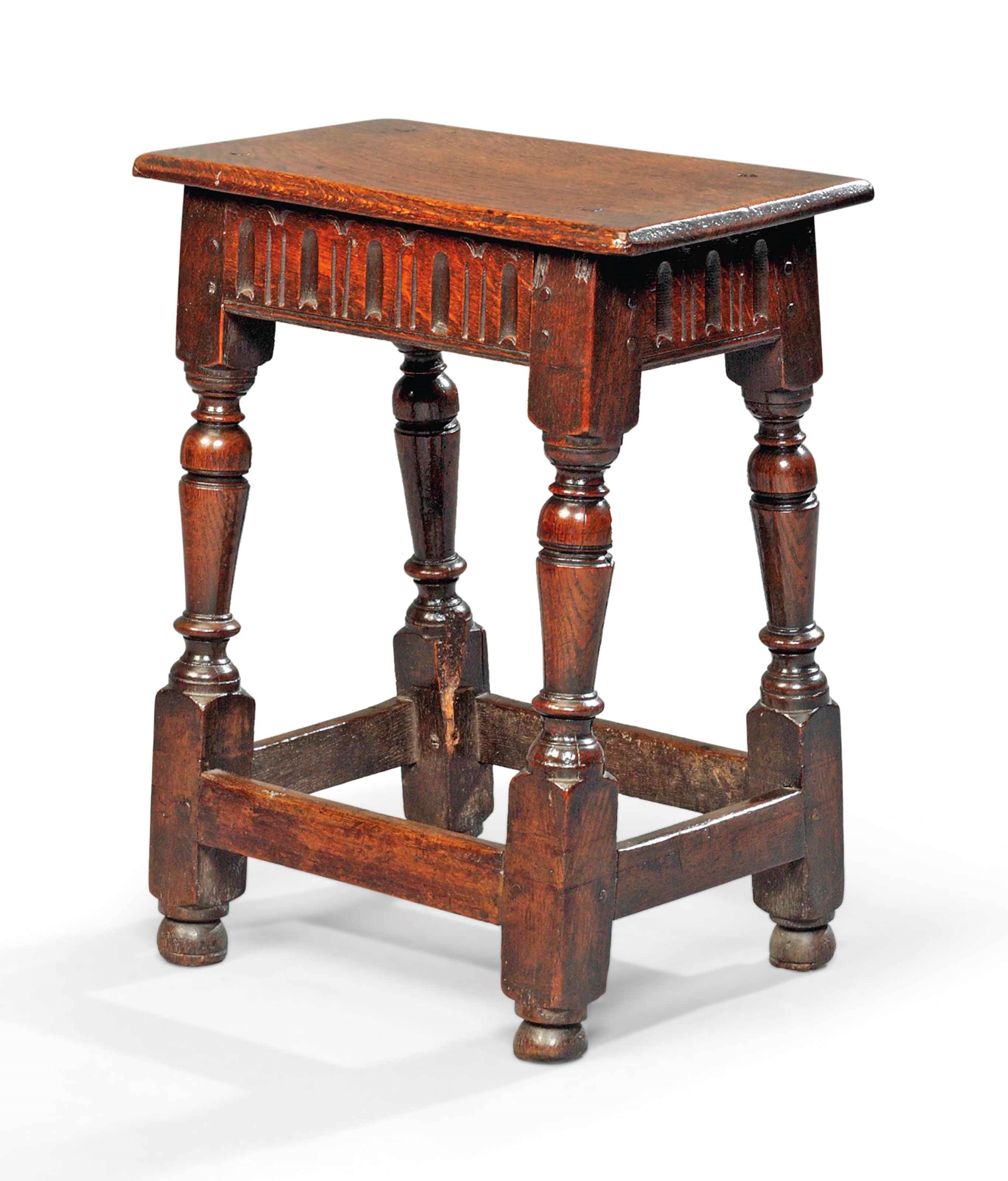 A JAMES I OAK JOINED STOOL
