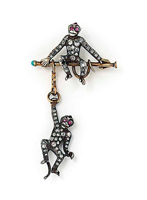 A TWIN MONKEYS BROOCH