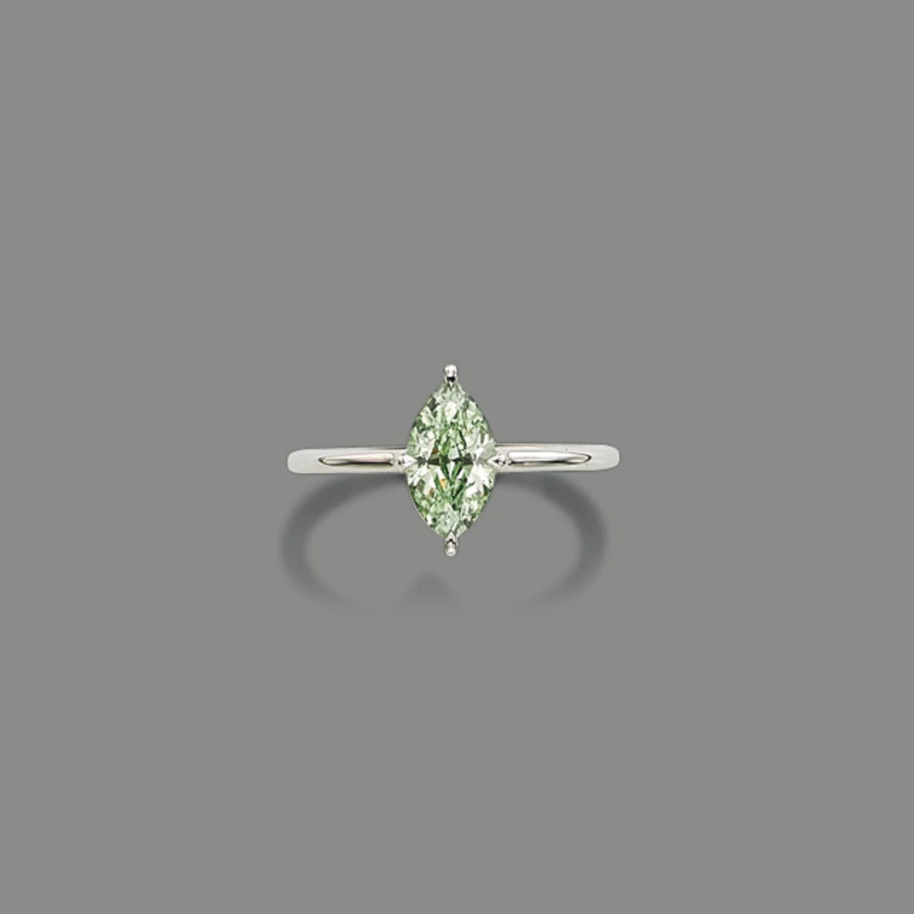 A COLOURED DIAMOND RING