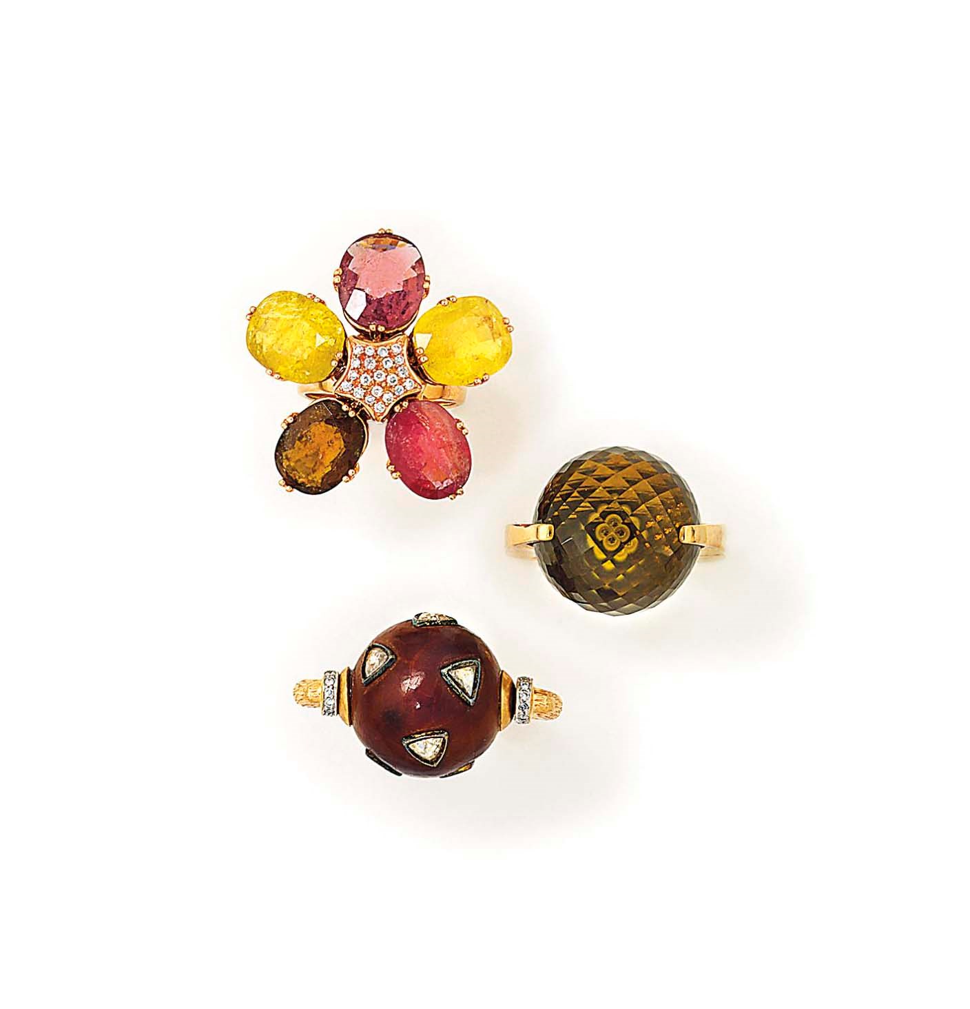 NINE GEM-SET RINGS