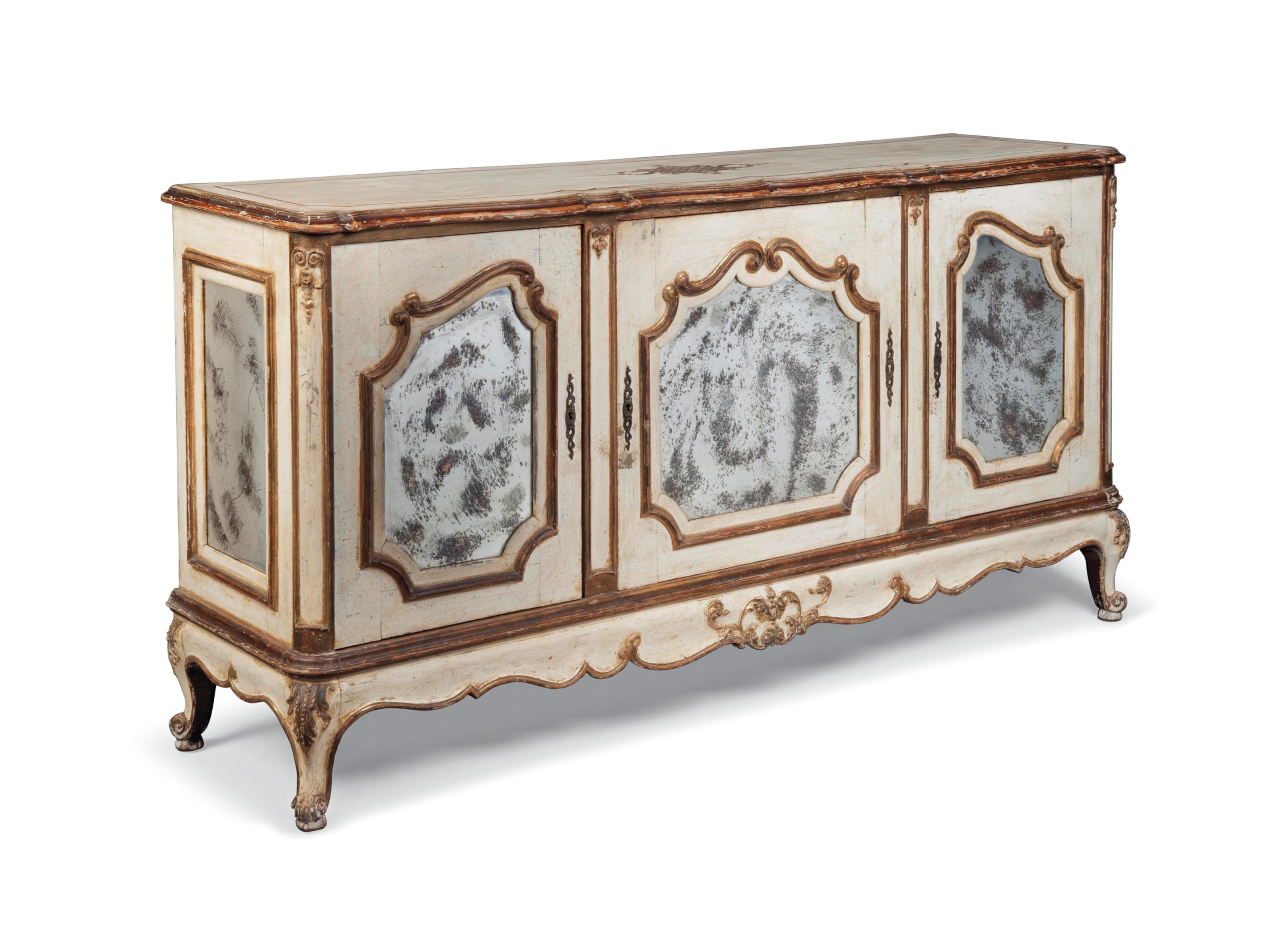 A PARCEL-GILT AND WHITE-PAINTED MIRRORED SIDE CABINET