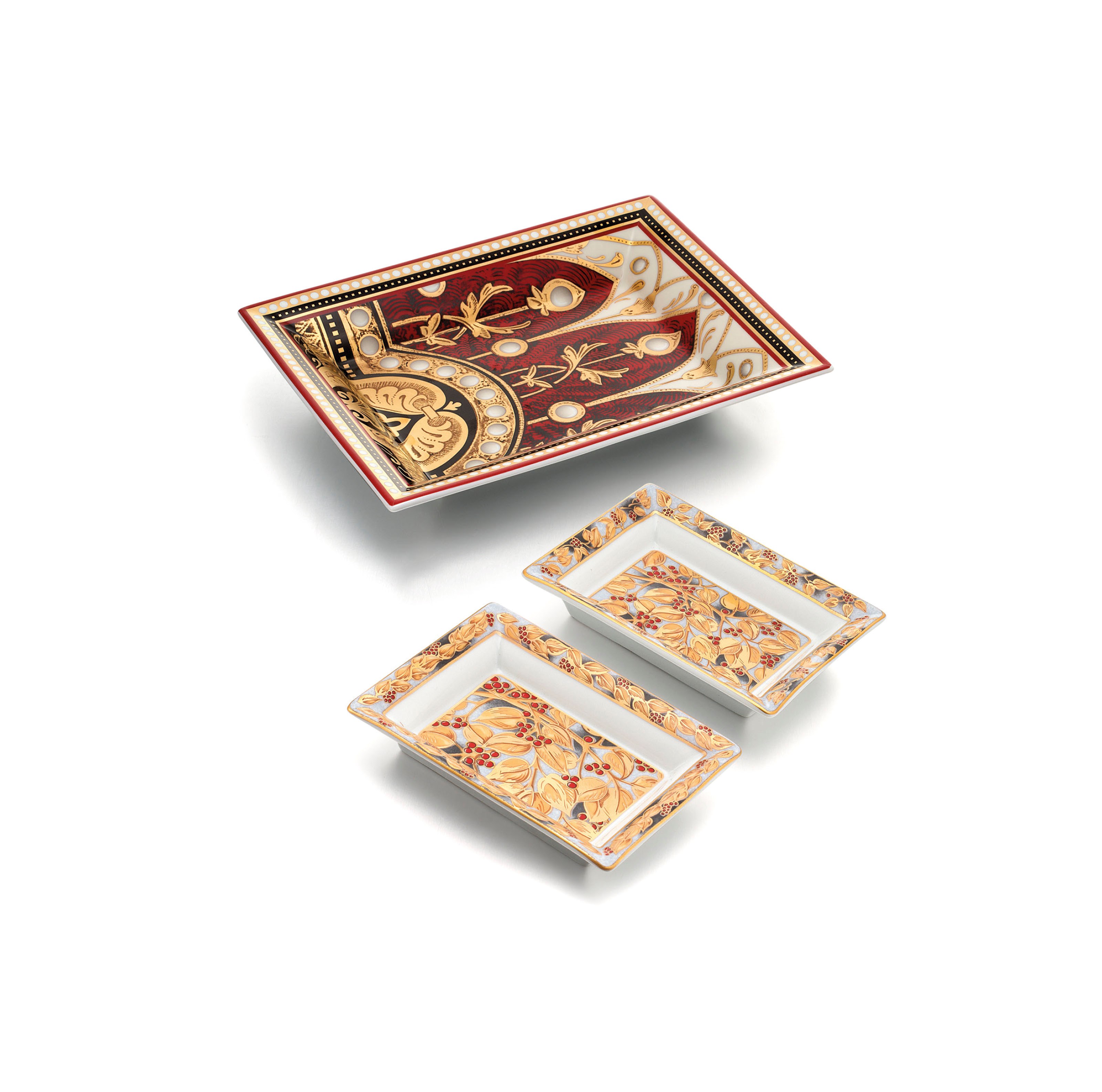 PATEK PHILIPPE. A GROUP OF THREE LIMOGES PORCELAIN DISHES