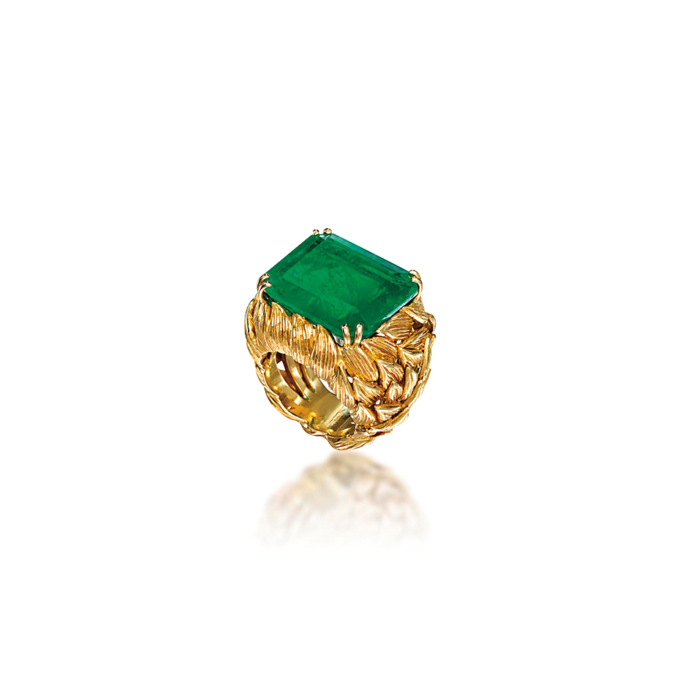 AN EMERALD COCKTAIL RING
