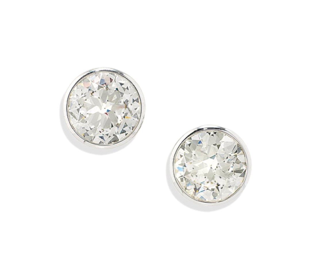 A PAIR OF SINGLE-STONE DIAMOND EAR STUDS