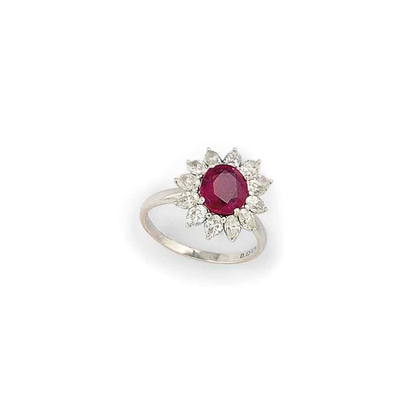 A RUBY AND DIAMOND CLUSTER RING