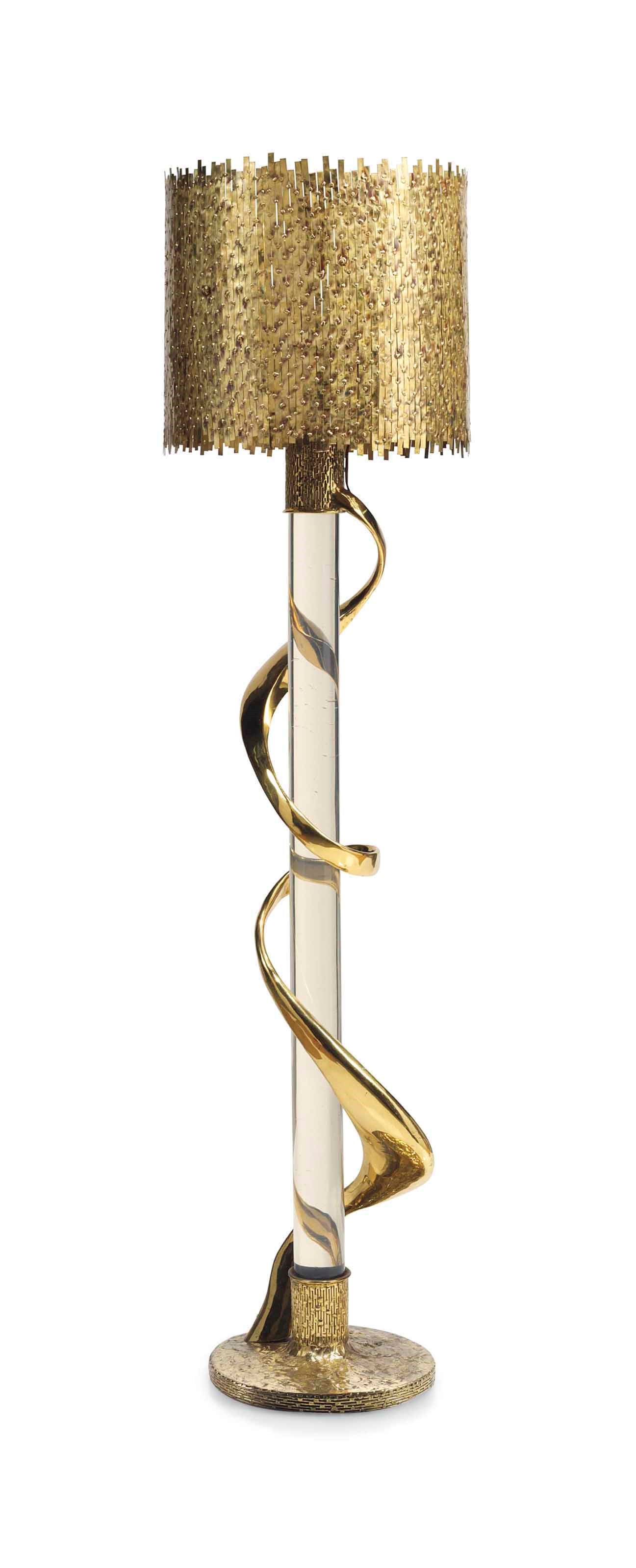A JACQUES DUVAL BRASSEUR GILT-BRASS AND PERSPEX FLOOR LAMP