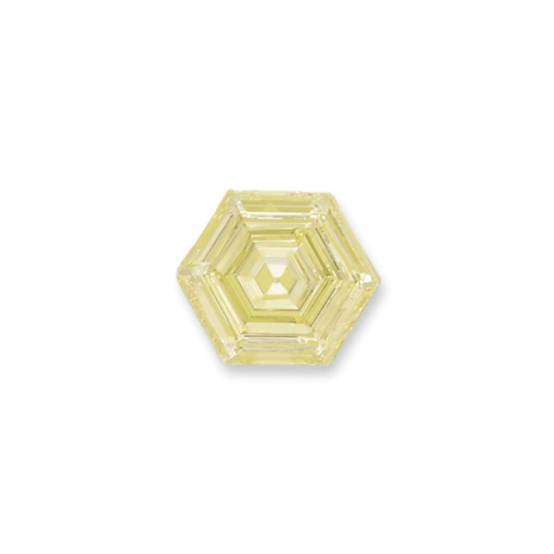 AN UNMOUNTED COLOURED DIAMOND