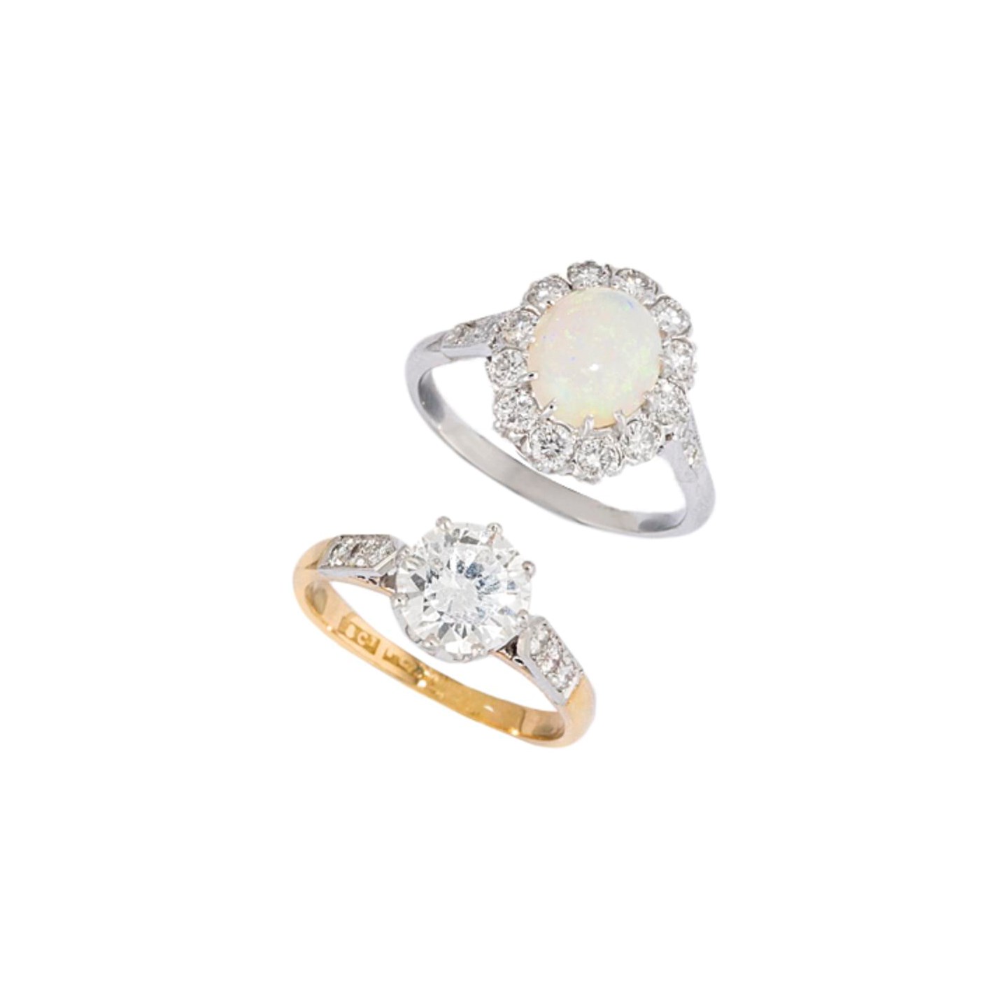 FOUR DIAMOND-SET RINGS