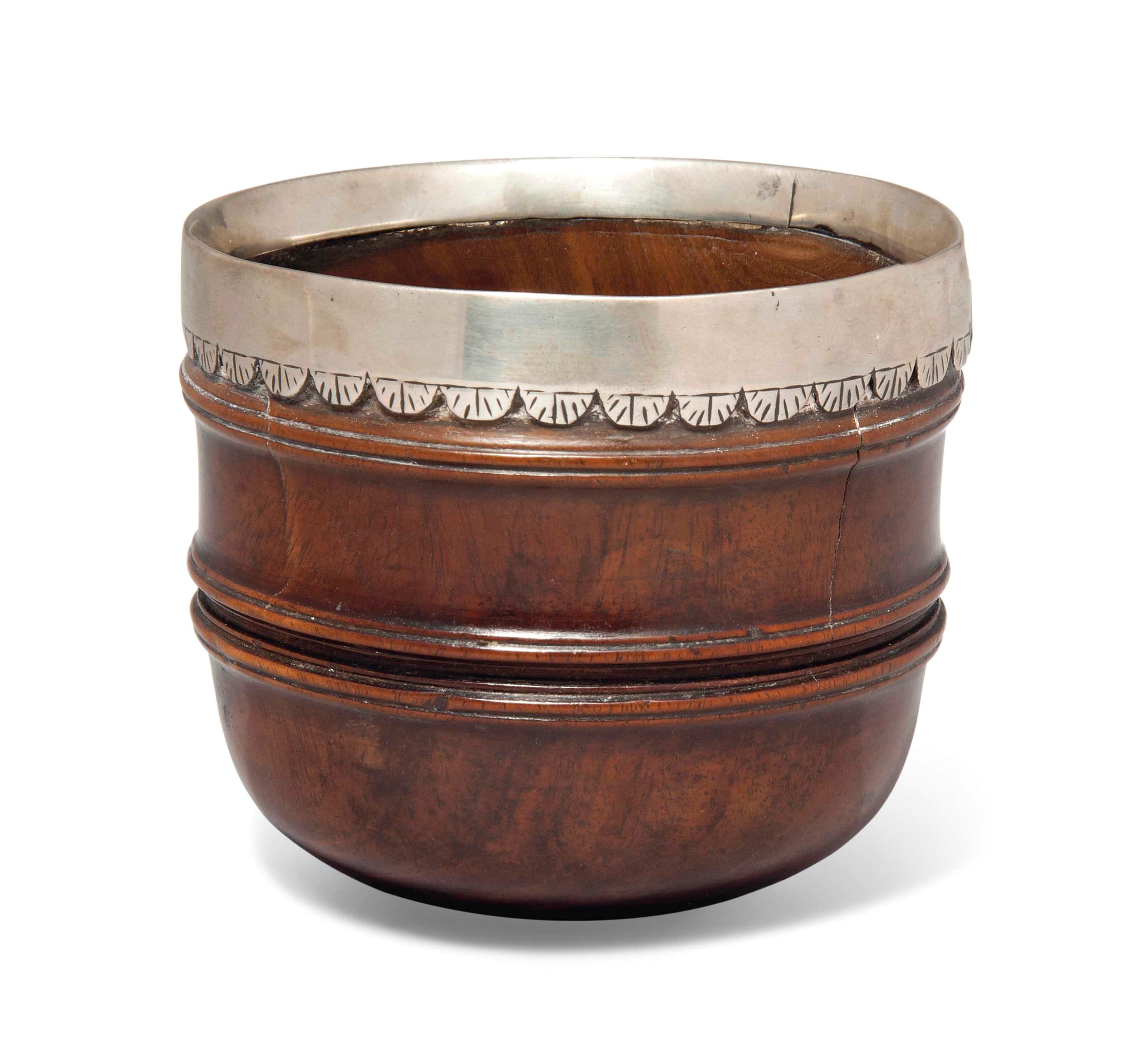 A SILVER-MOUNTED LIGNUM VITAE DIPPER CUP
