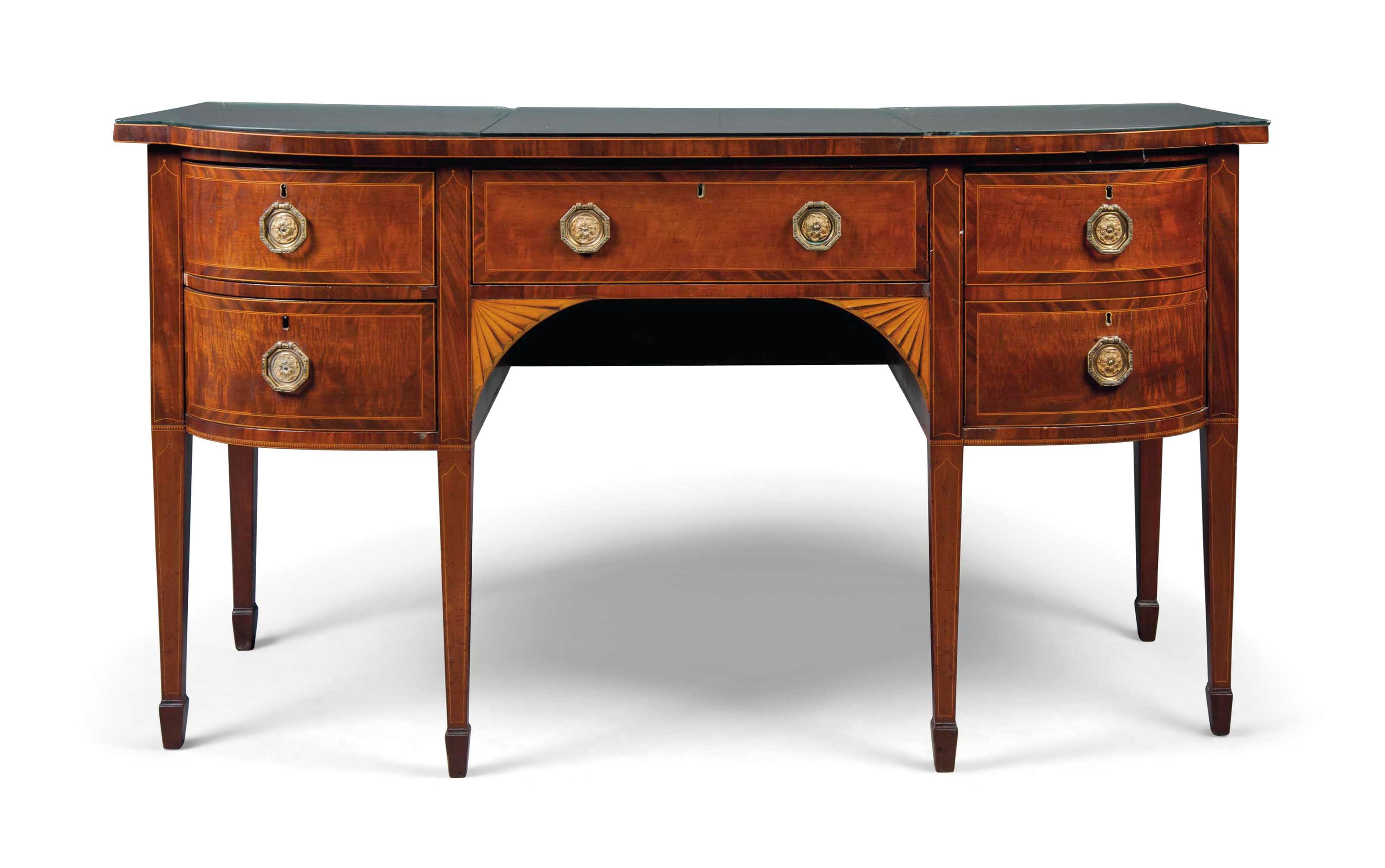A LATE GEORGE III MAHOGANY AND INLAID BOW-FRONT SIDEBOARD