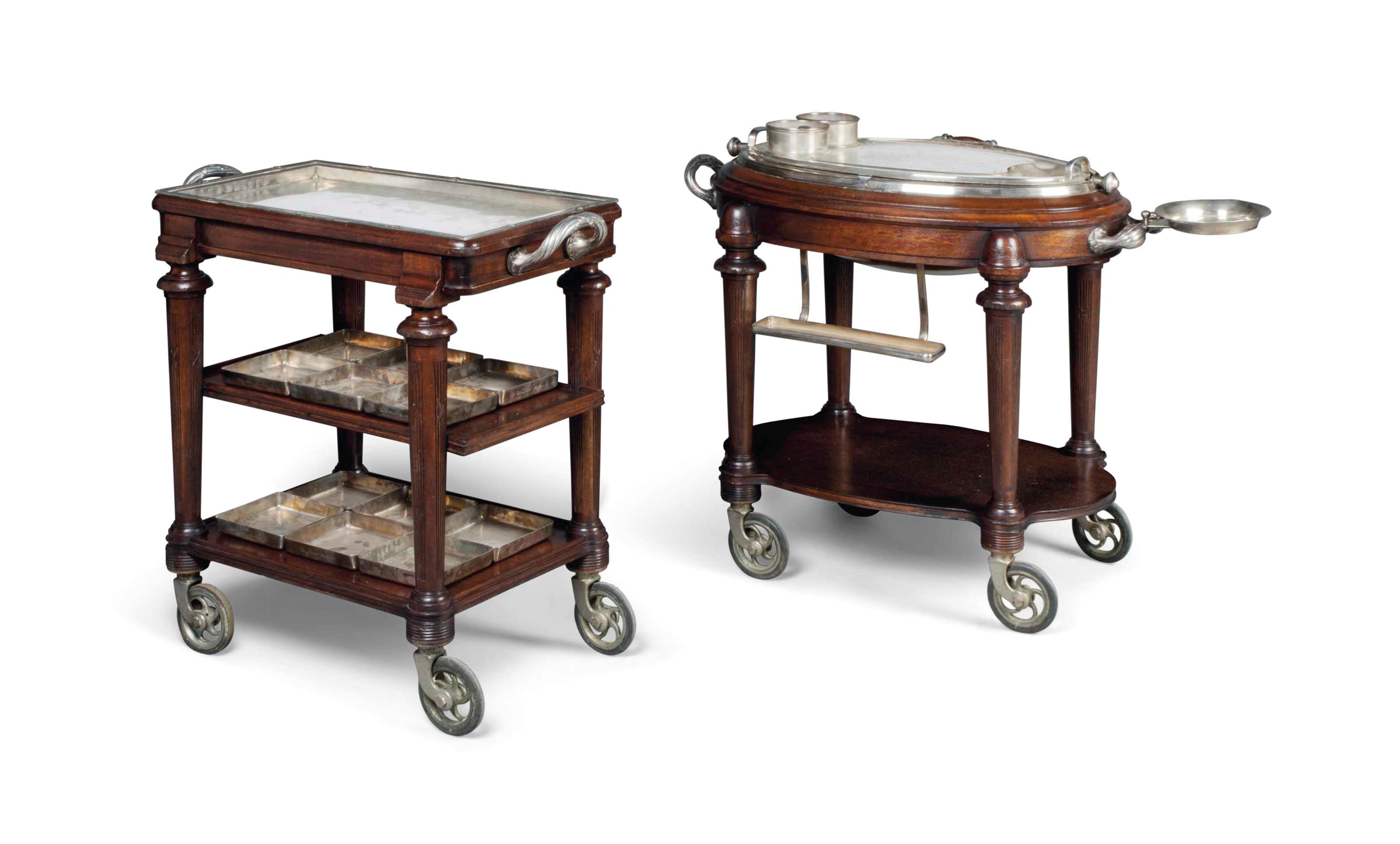 A PAIR OF FRENCH MAHOGANY AND SILVER-PLATED DINING TROLLEYS