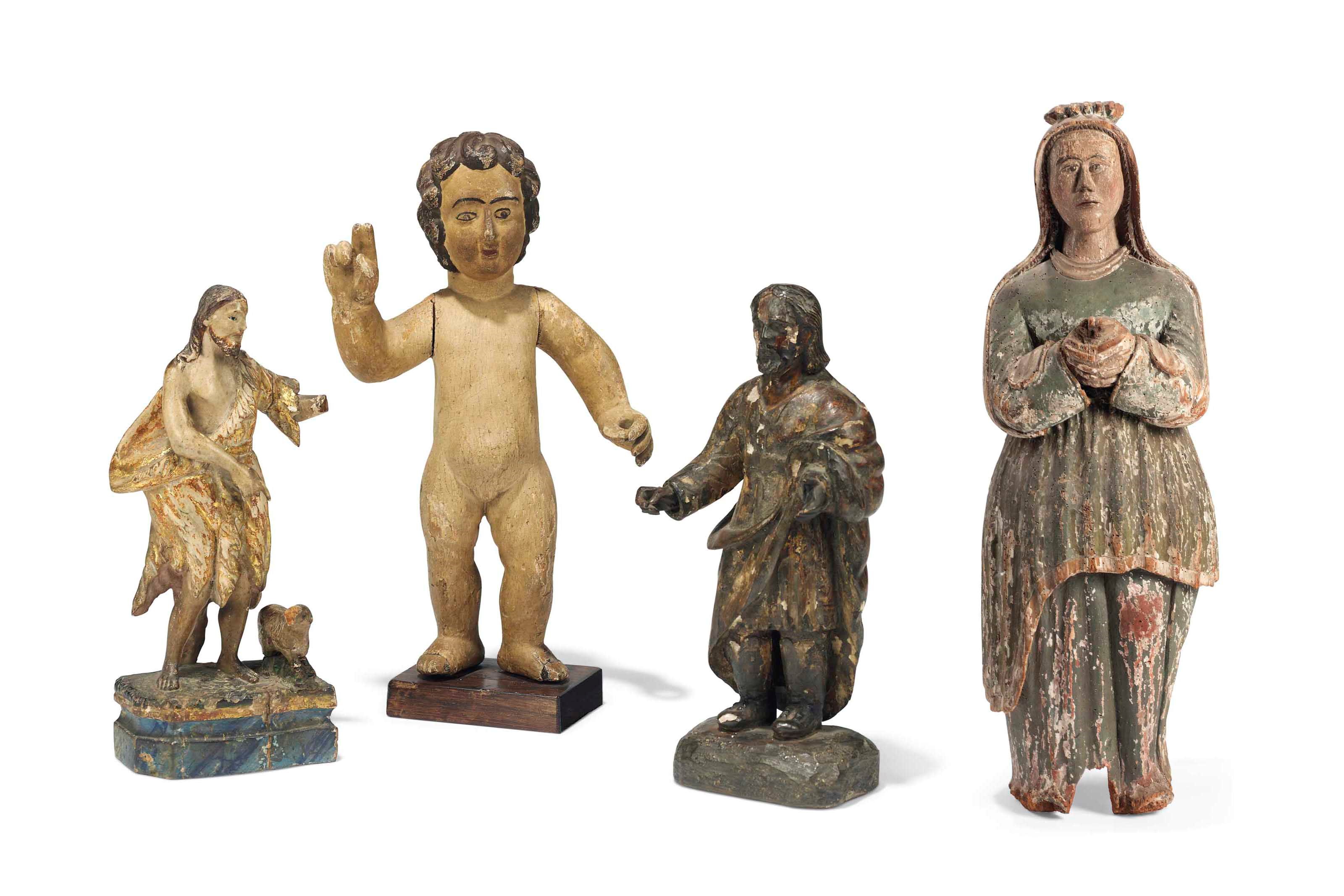 A SPANISH OR SPANISH COLONIAL POLYCHROME DECORATED CARVED WOOD FIGURE OF THE VIRGIN MARY