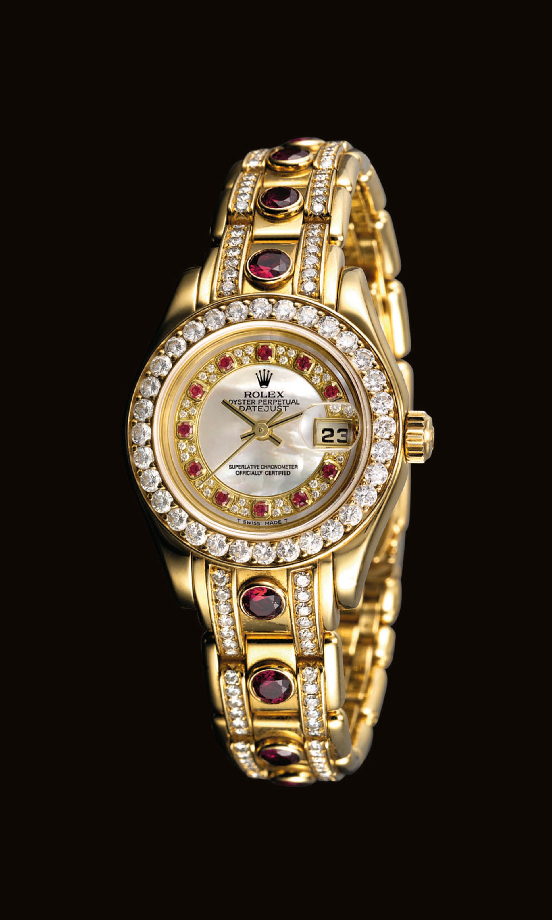 ROLEX. A LADY'S FINE AND RARE 18K GOLD, DIAMOND AND RUBY-SET AUTOMATIC WRISTWATCH WITH SWEEP CENTRE SECONDS, DATE, BRACELET AND MOTHER-OF-PEARL DIAL