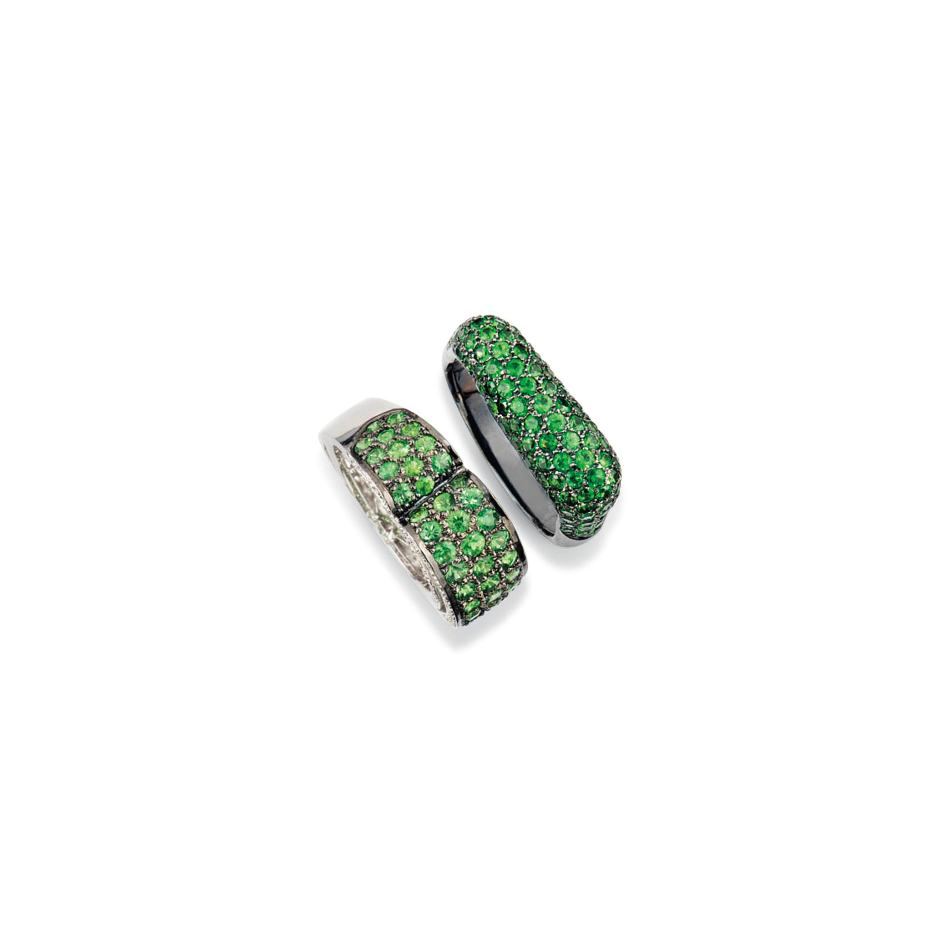 FOUR GREEN GARNET-SET RINGS