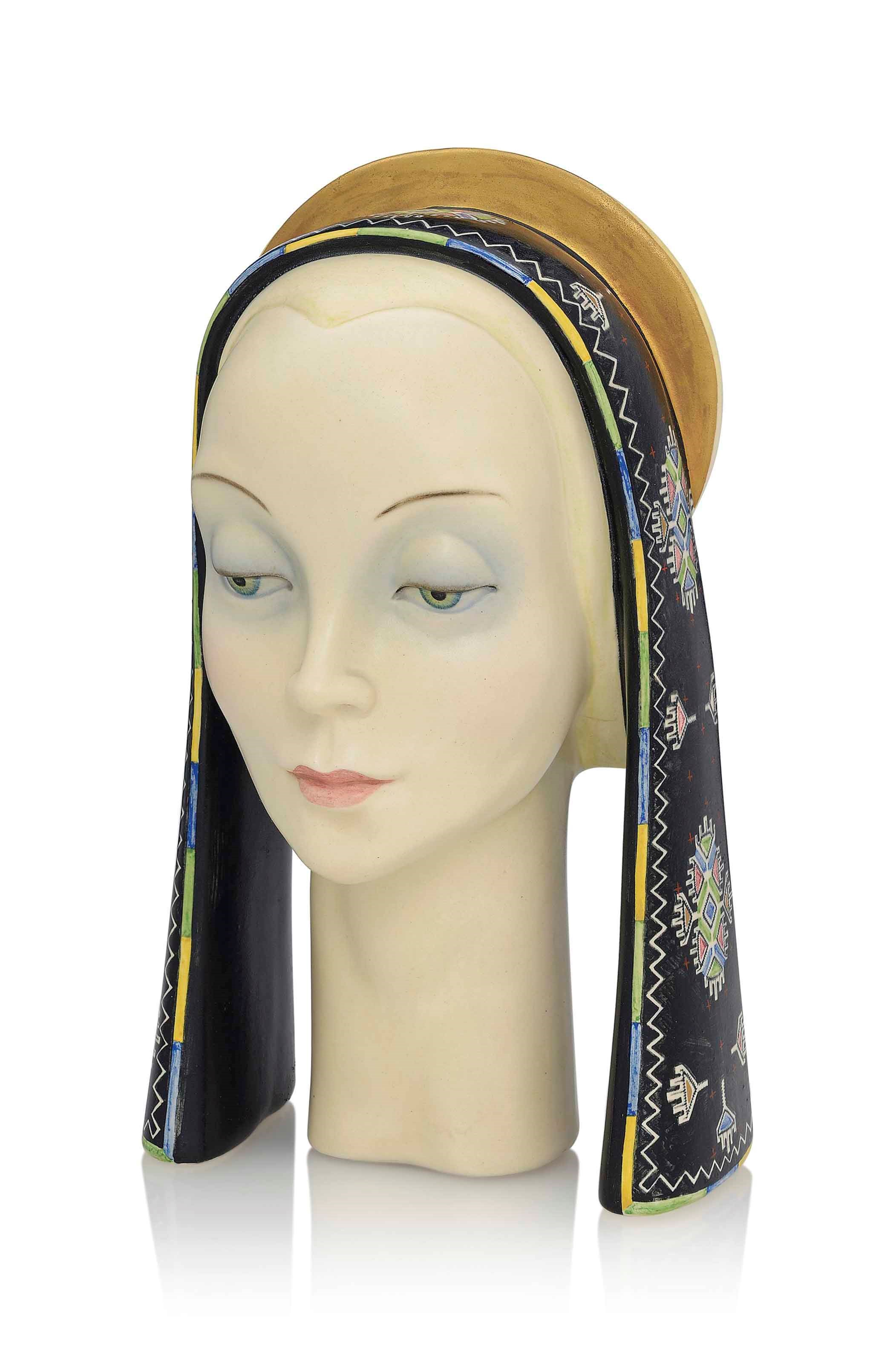 A LENCI GLAZED AND PAINTED CERAMIC HEAD BY HELEN KONIG SCAVINI