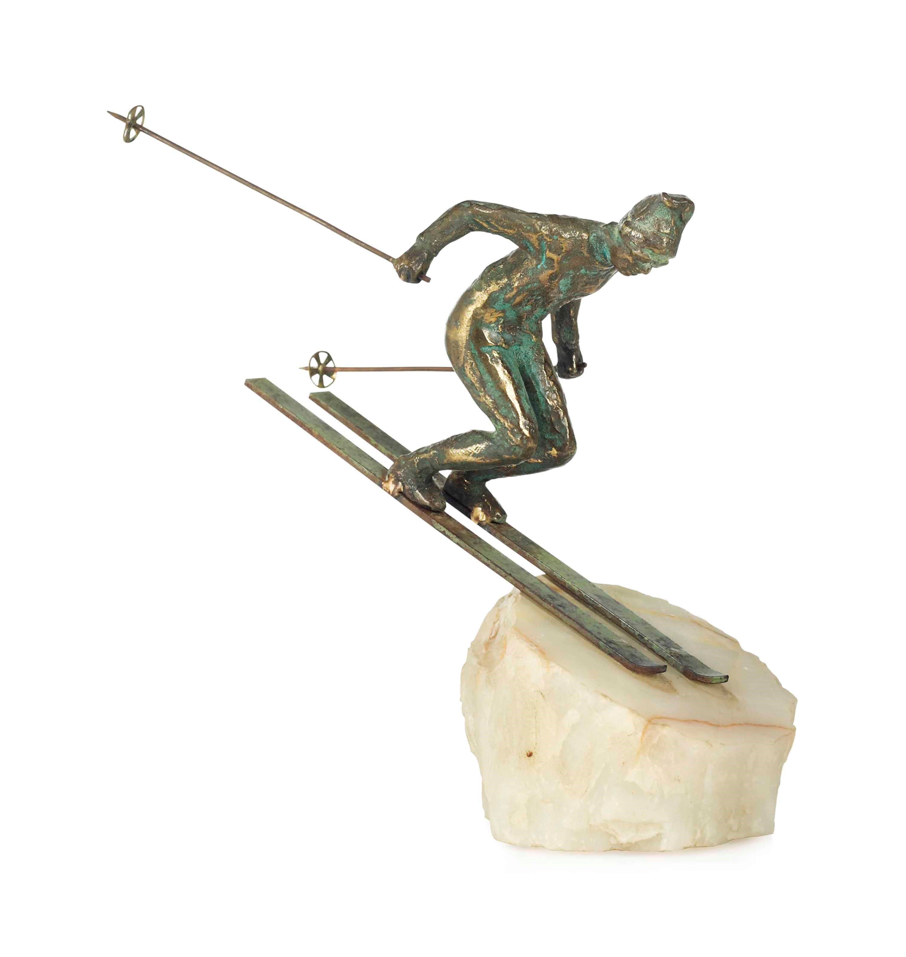 A CURTIS JERE (AMERICAN) BRONZE FIGURE CAST AS A SKIER ON AN ONYX BASE