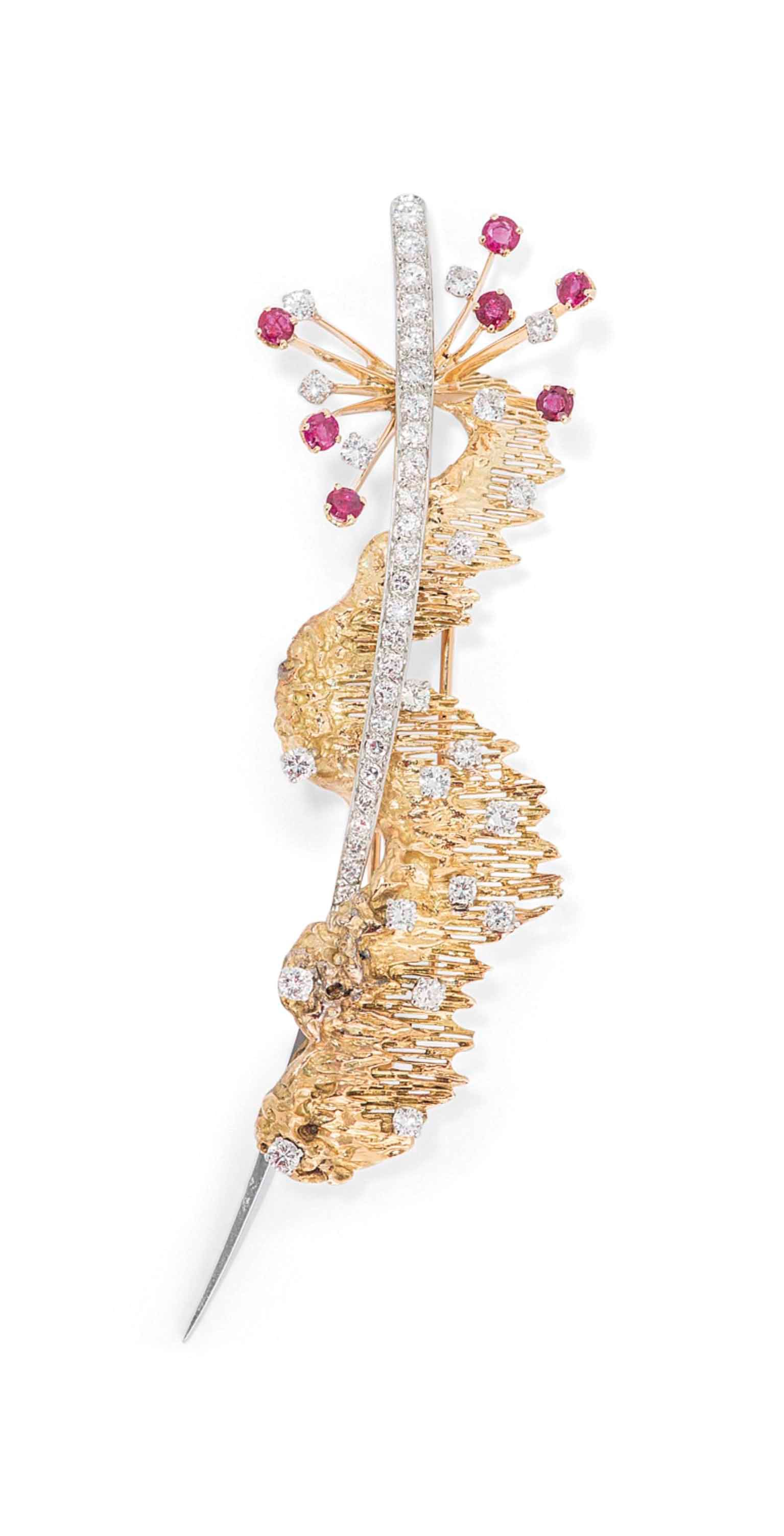 A DIAMOND AND RUBY CLIP BROOCH, BY BOUCHERON