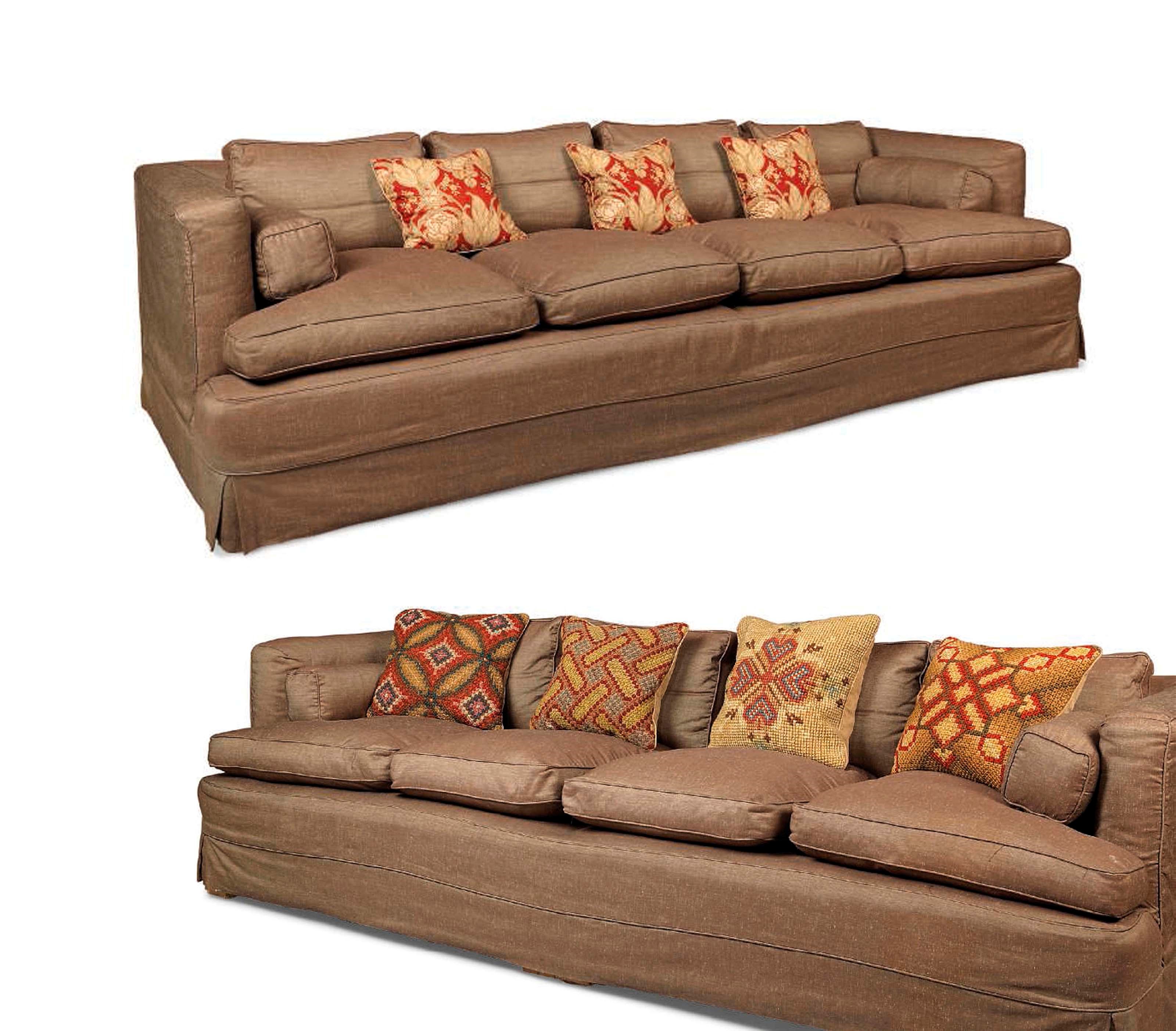 A PAIR OF FOUR SEAT SOFAS