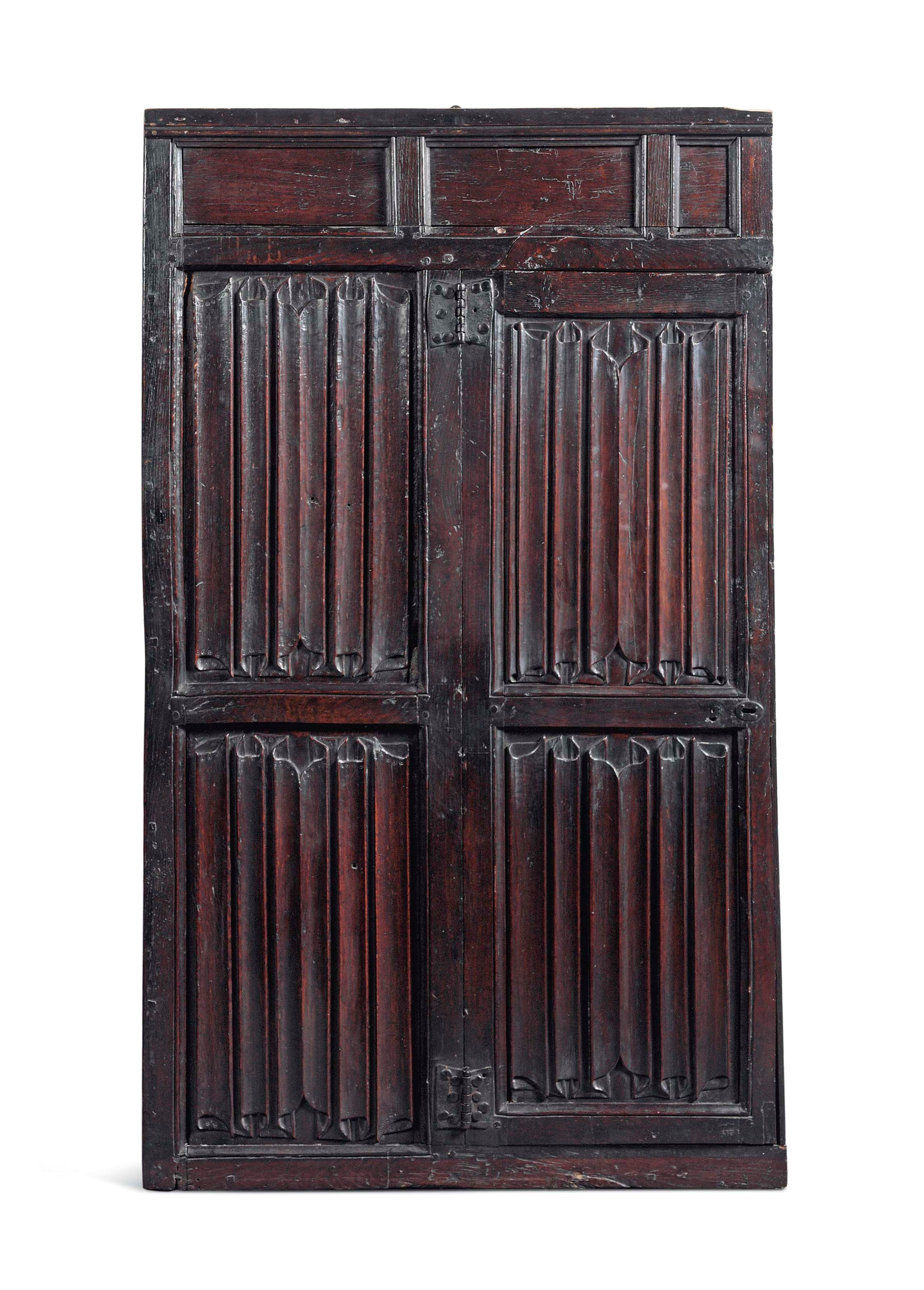 FOUR SECTIONS OF ELIZABETHAN LINEN FOLD PANELLING