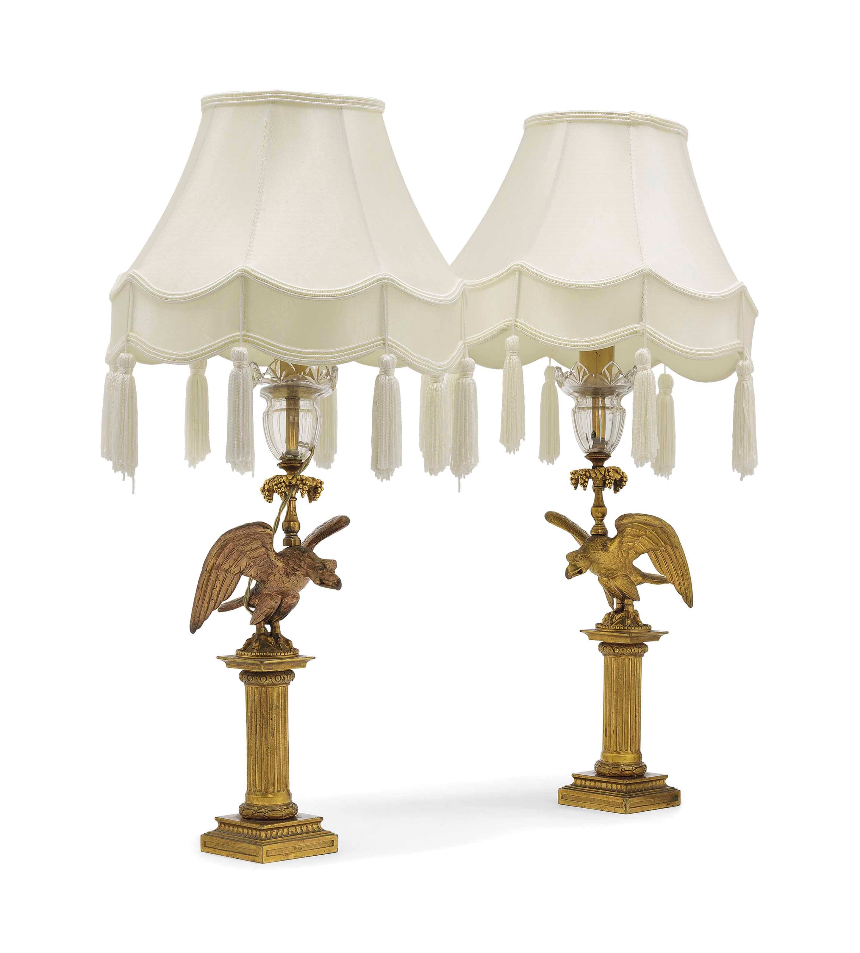 A PAIR OF ENGLISH GILT-BRONZE AND GLASS MOUNTED TABLE LAMPS