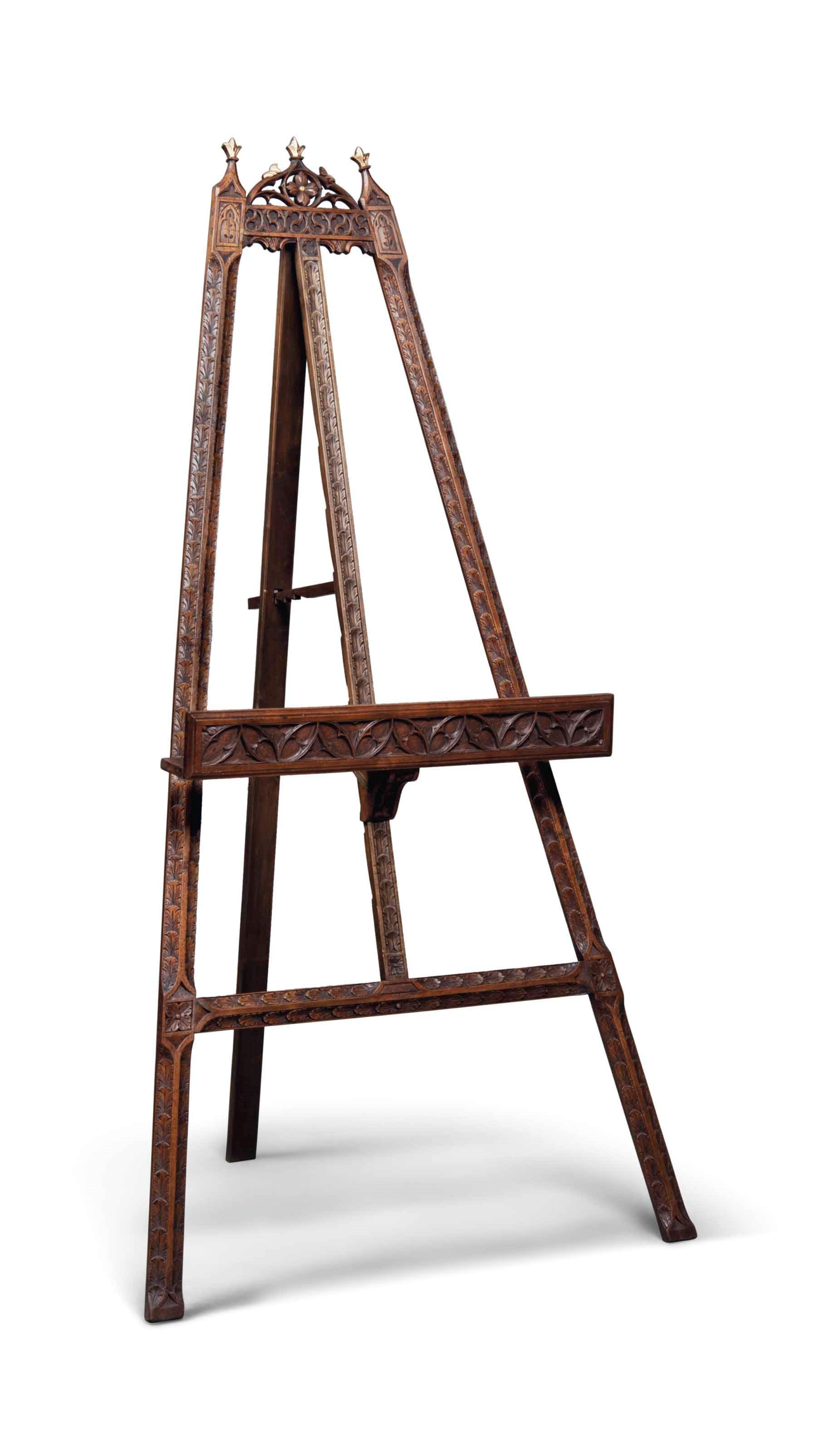 AN ITALIAN CARVED WALNUT GALLERY EASEL