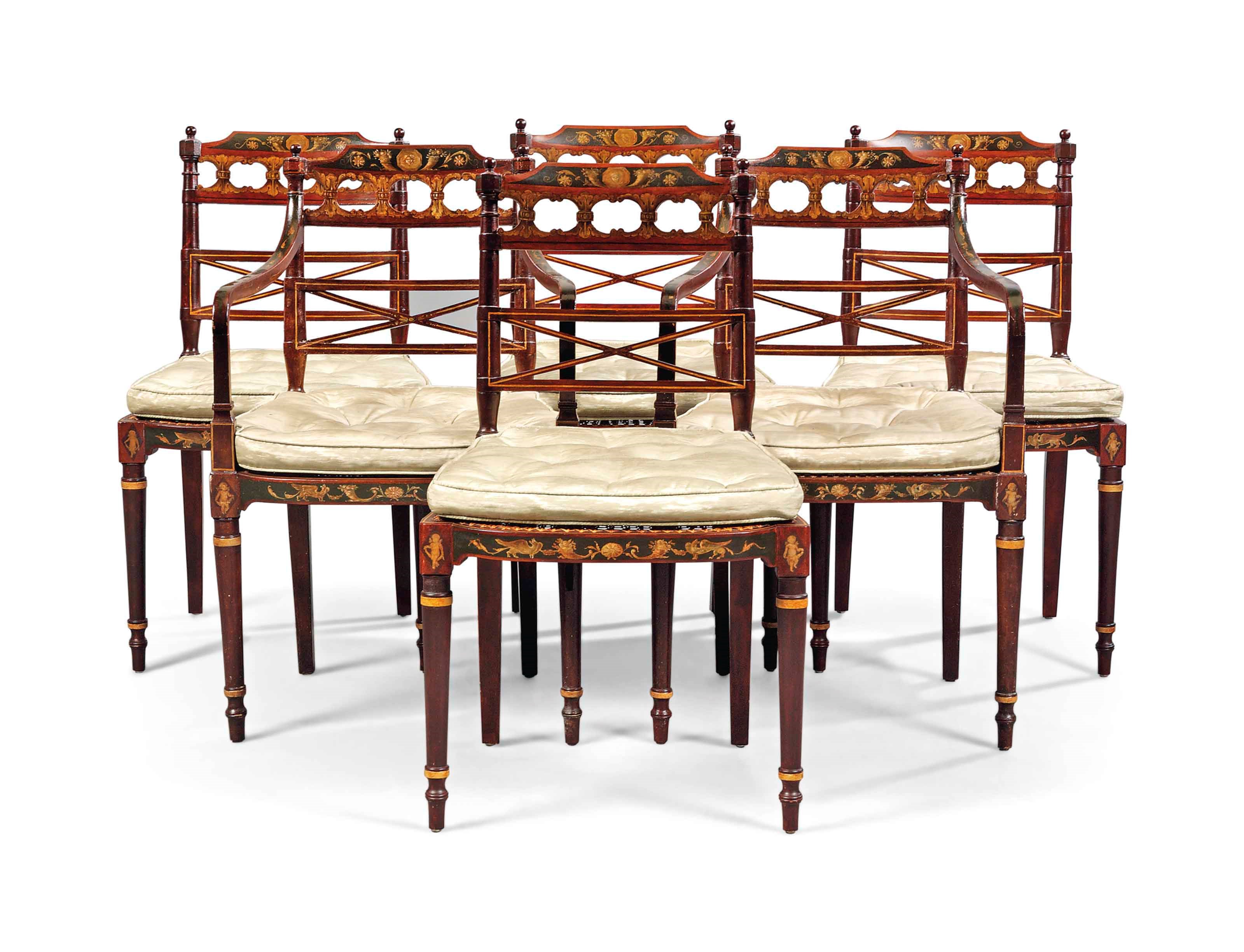 A PAIR OF GEORGE III POLYCHROME-PAINTED AND CANED OPEN ARMCHAIRS