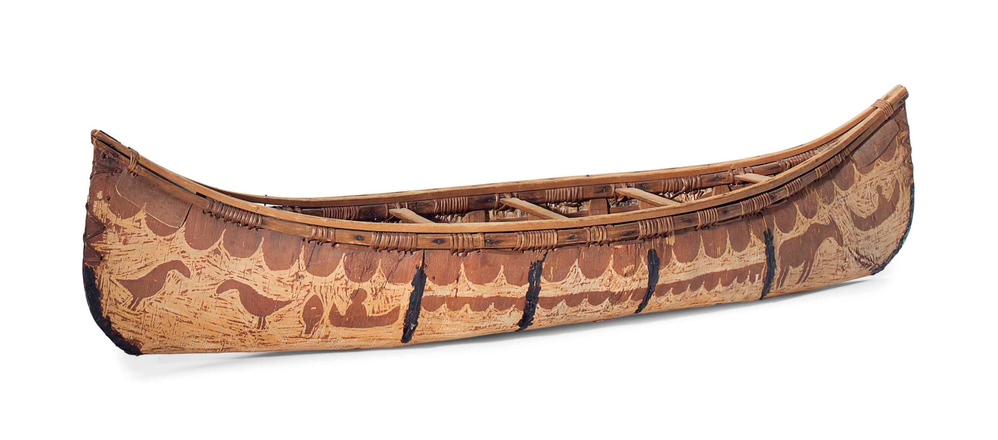 A MINIATURE MODEL OF BIRCH BARK CANOE
