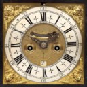 A WILLIAM AND MARY REPOUSSE BRASS-MOUNTED EBONY STRIKING TABLE CLOCK WITH PULL QUARTER REPEAT
