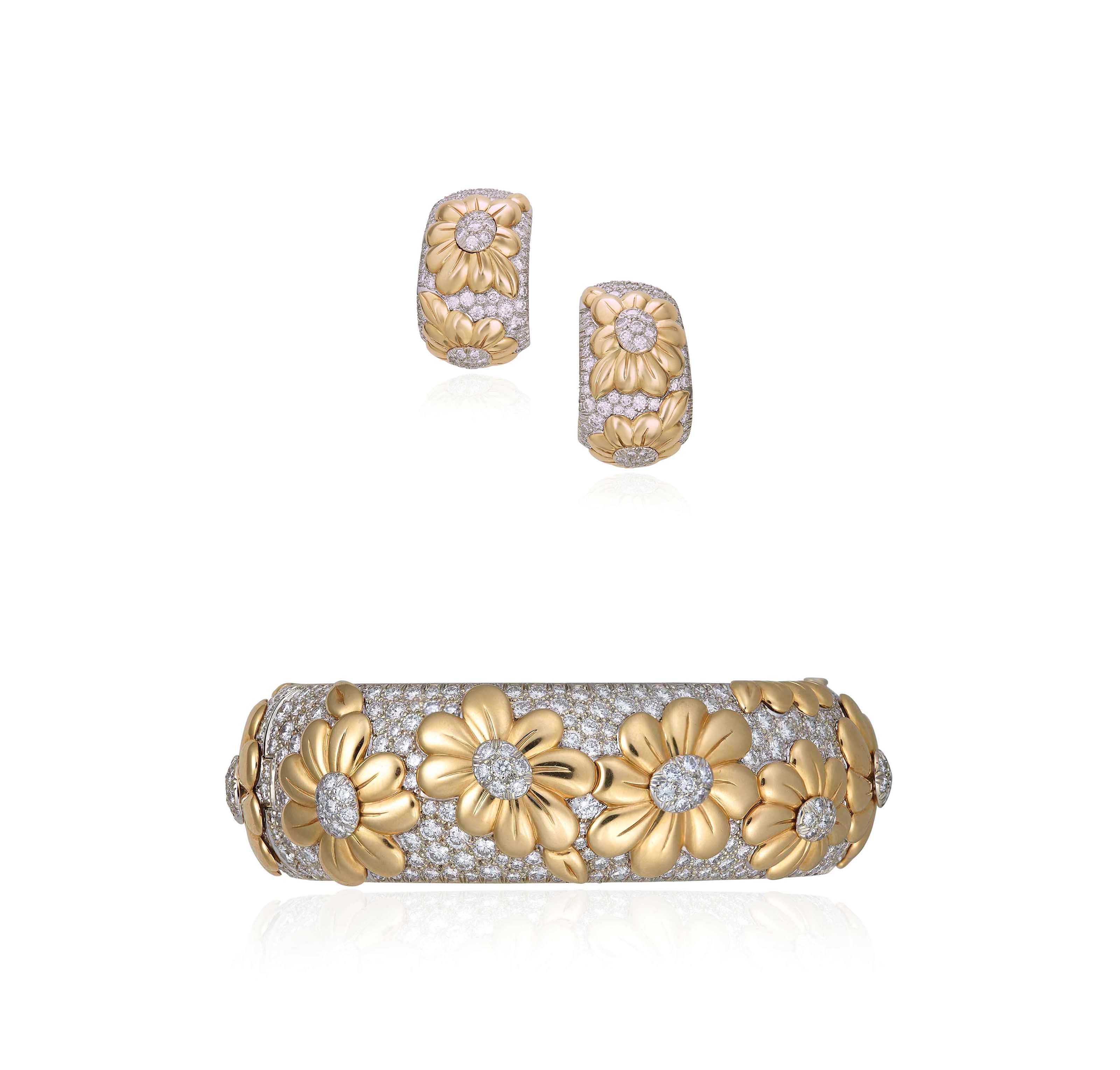 A DIAMOND BANGLE AND EARRING SET, BY VAN CLEEF & ARPELS