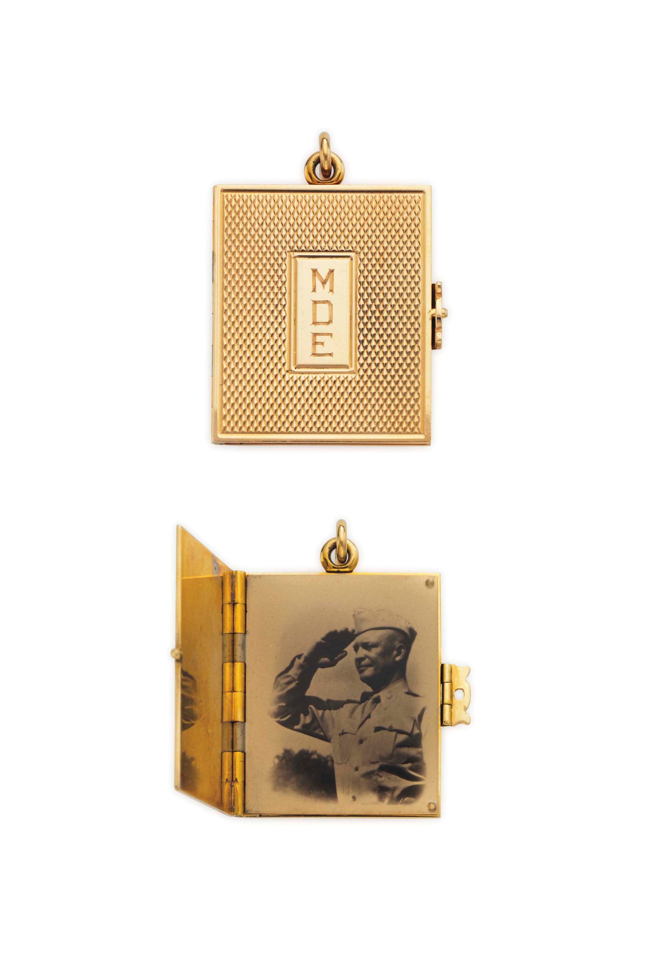 A GOLD LOCKET CHARM