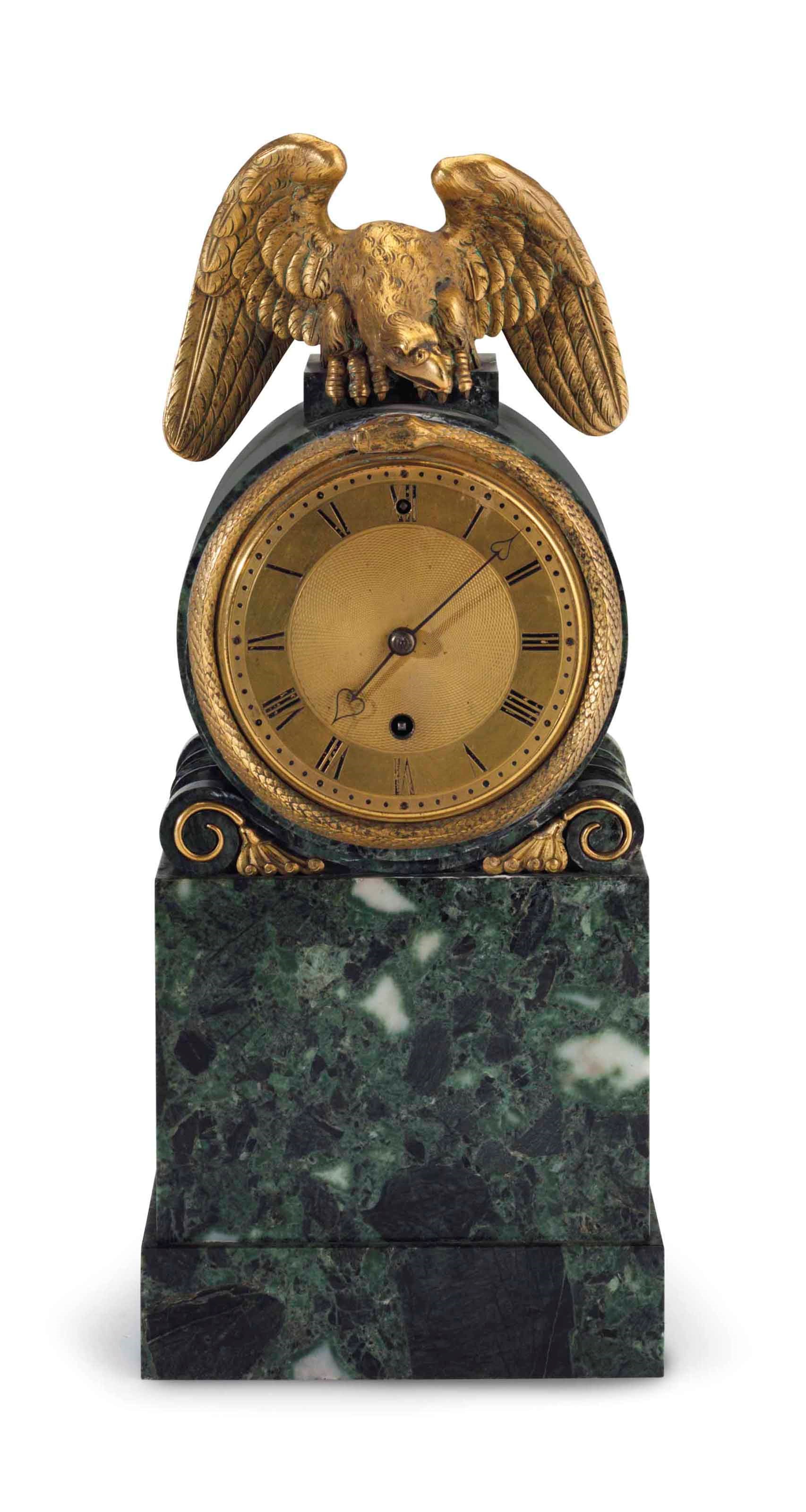 A REGENCY ORMOLU-MOUNTED MONA MARBLE MANTLE CLOCK