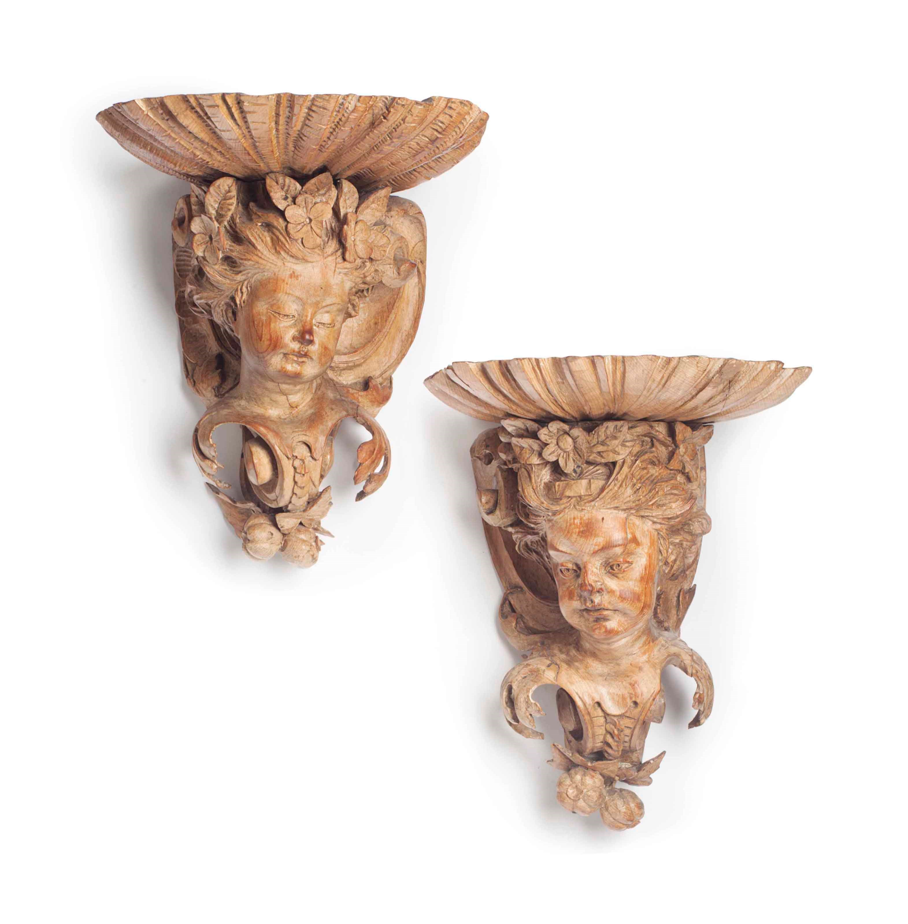 A PAIR OF GEORGE II PINE WALL BRACKETS