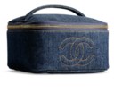 A SET OF TWO:A SMALL BLUE DENIM VANITY CASE WITH GOLD HARDWAREA LARGE BLUE DENIM VANITY CASE WITH GOLD HARDWARE