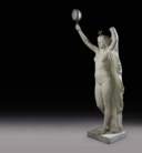 A LIFE-SIZE FRENCH MARBLE FIGURAL TORCHERE