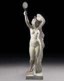 A LIFE-SIZE FRENCH MARBLE FIGURAL TORCHERE