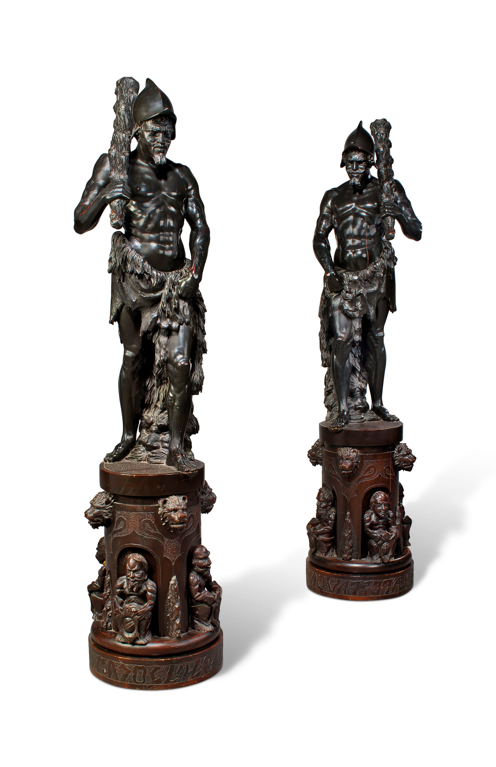A PAIR OF ITALIAN EBONISED-PINE WARRIOR FIGURES ON PEDESTALS