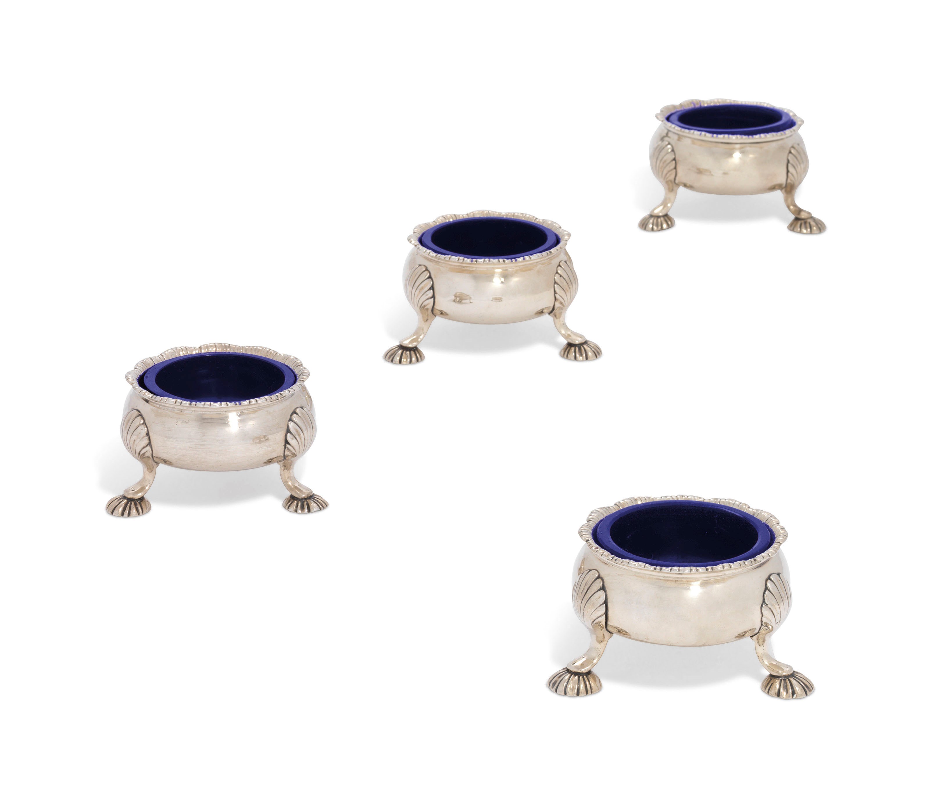 A SET OF FOUR GEORGE III SILVER SALT-CELLARS