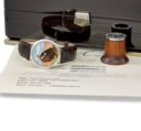 Patek Philippe. A very fine and extremely rare platinum limited edition automatic wristwatch with unique cloisonné enamel "American Eagle" dial signed by Anita Porchet, Certificate of Origin and box