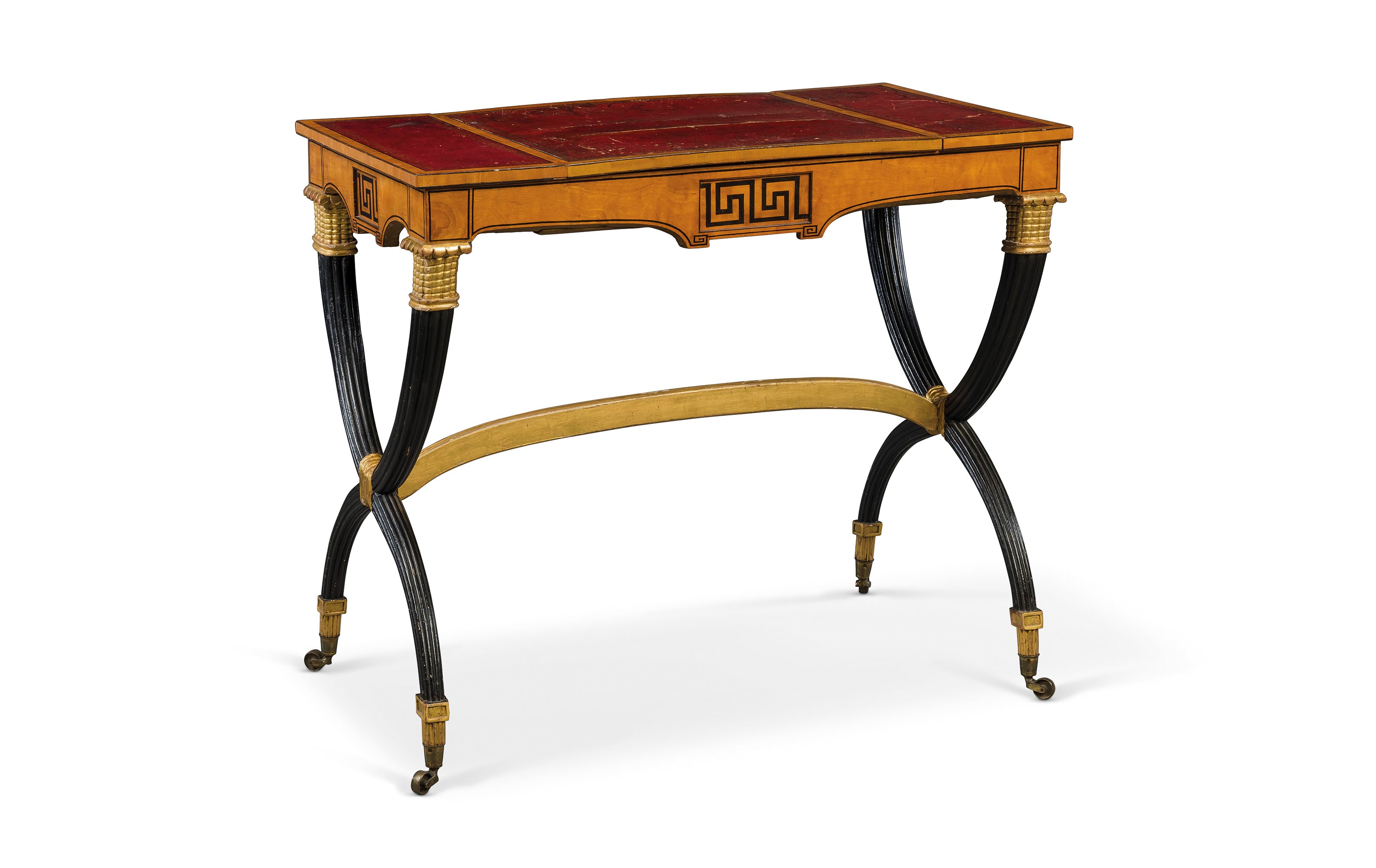 A REGENCY PARCEL-GILT AND EBONISED SATINWOOD GAMES TABLE