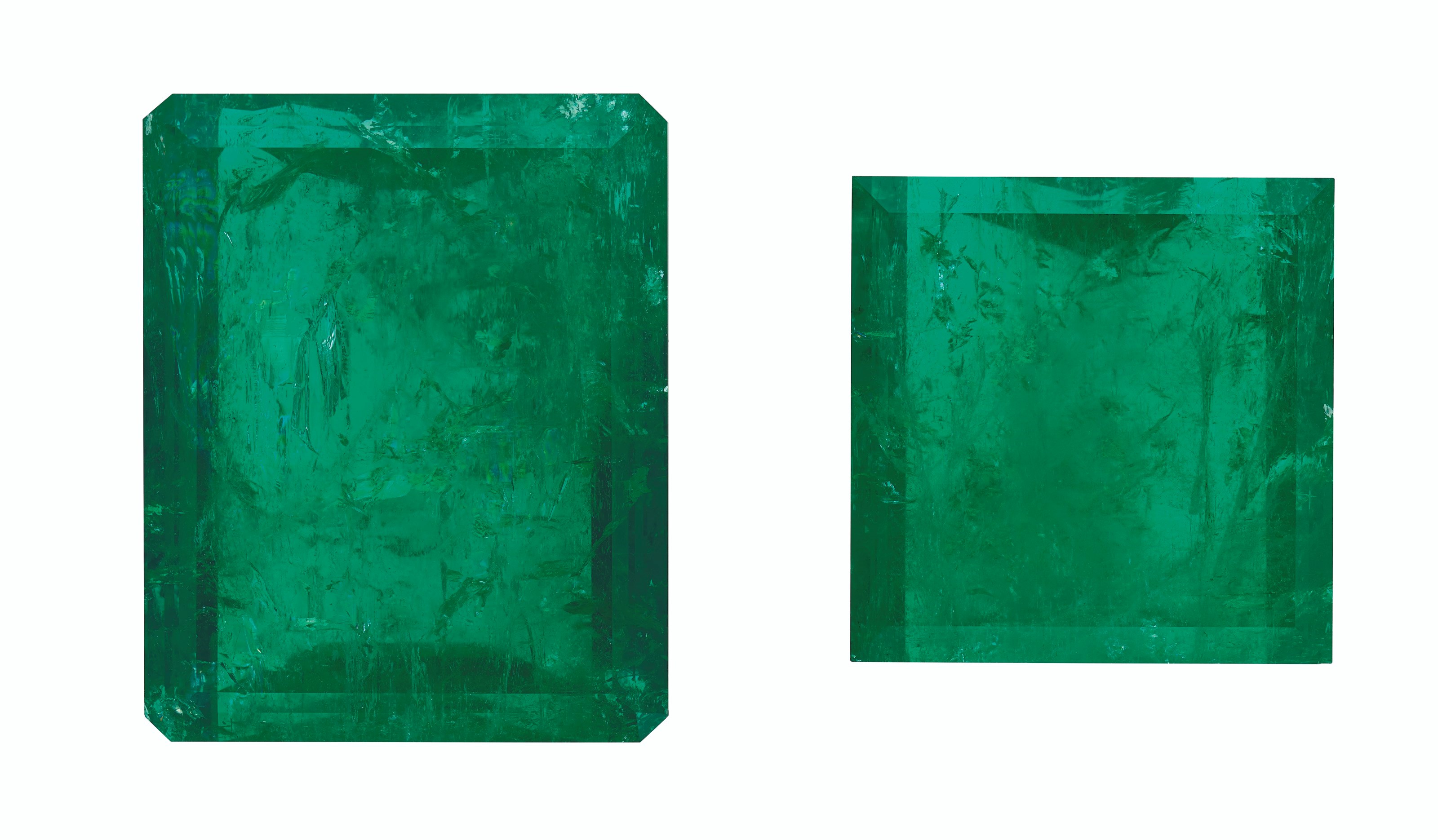 TWO UNMOUNTED EMERALDS