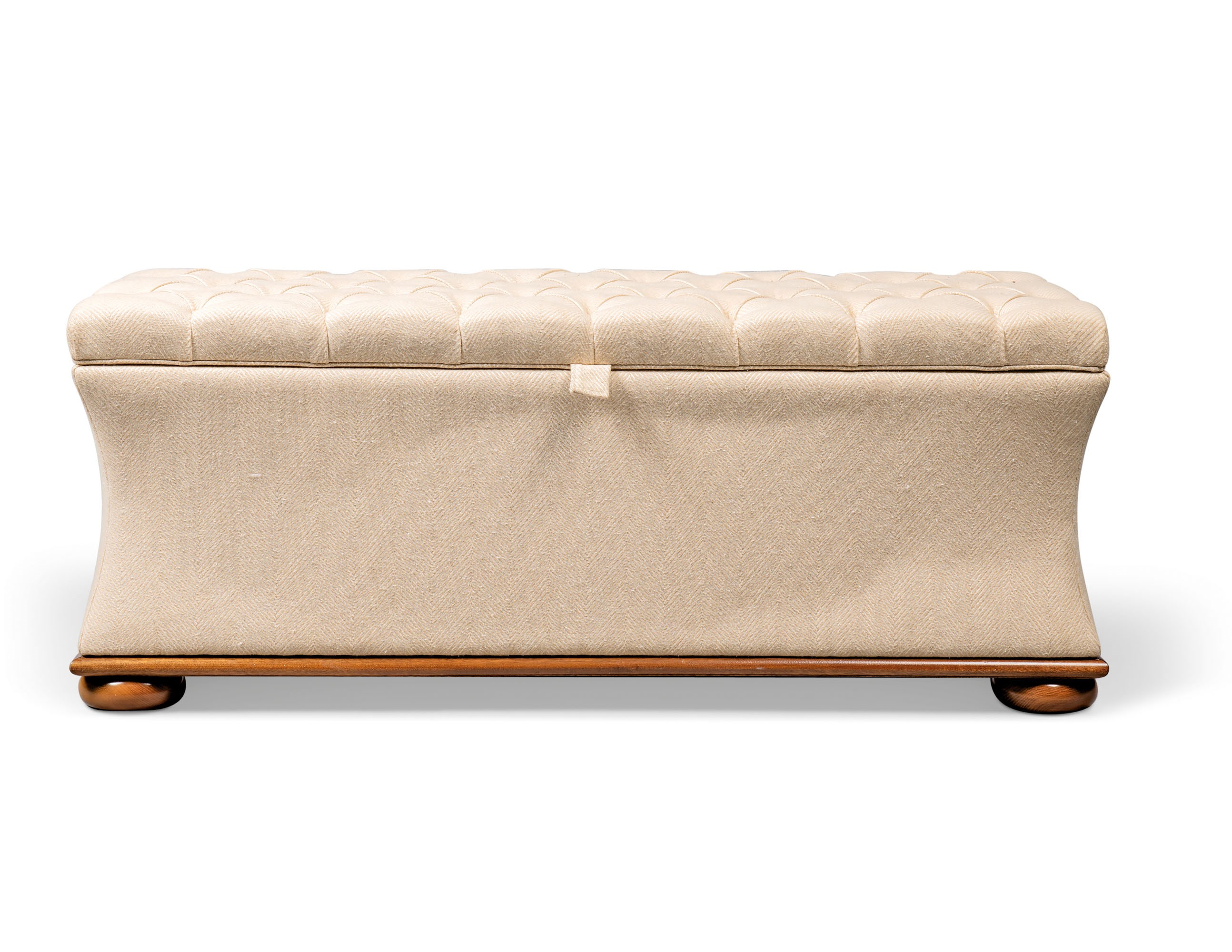 A BUTTONED-COTTON OTTOMAN