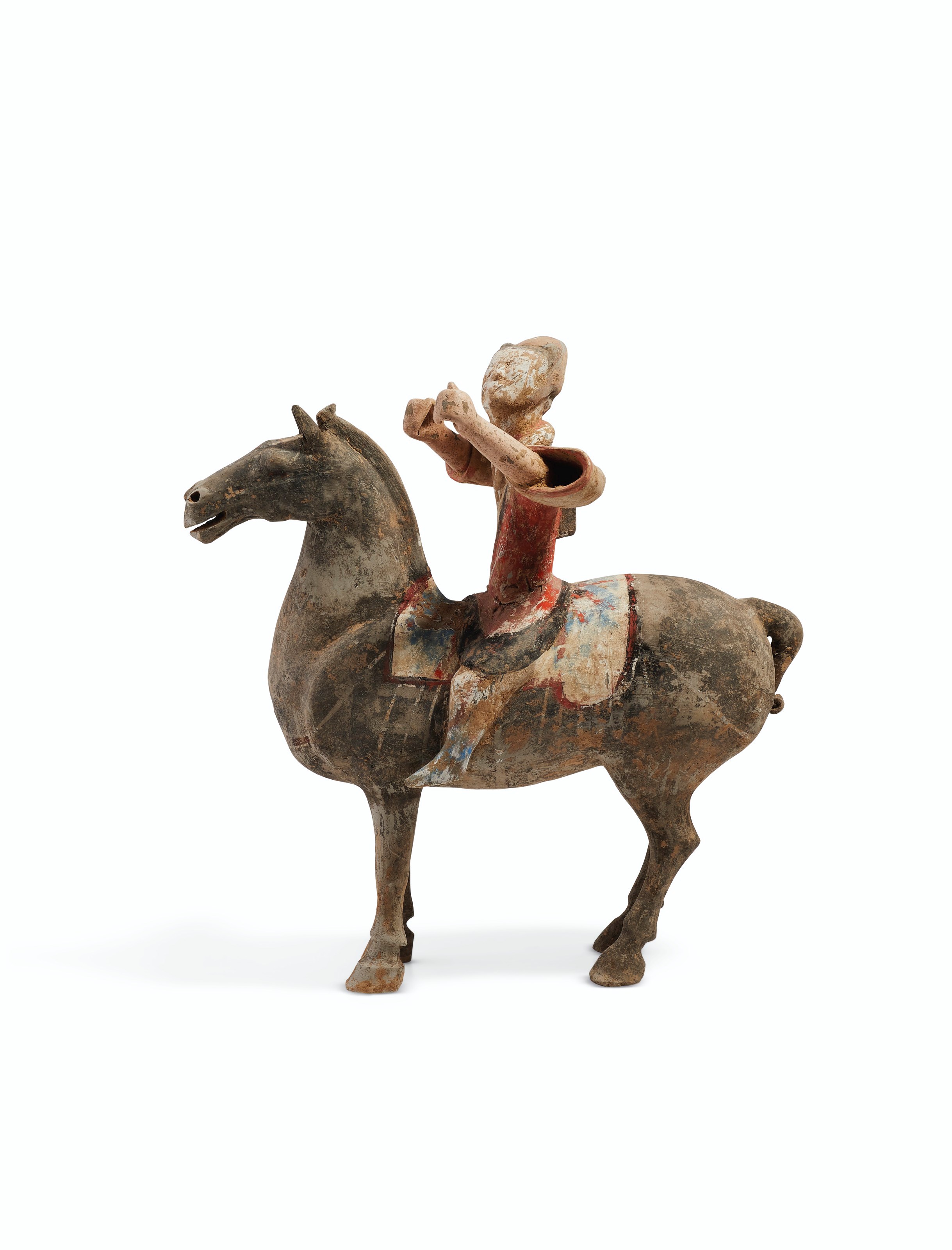 A CHINESE PAINTED GREY POTTERY FIGURE OF AN ARCHER ON HORSEBACK