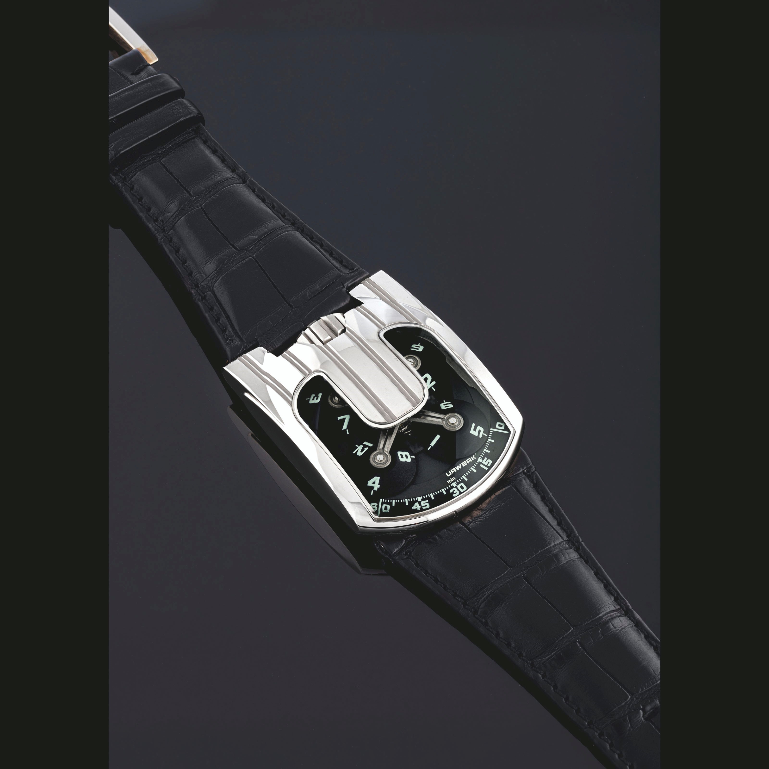 URWERK，18K白金及钛金属腕表，配旋转时针及动力储存，URWERK 103，型号103.07，约2006年制，附原厂证书、盒子及外包装