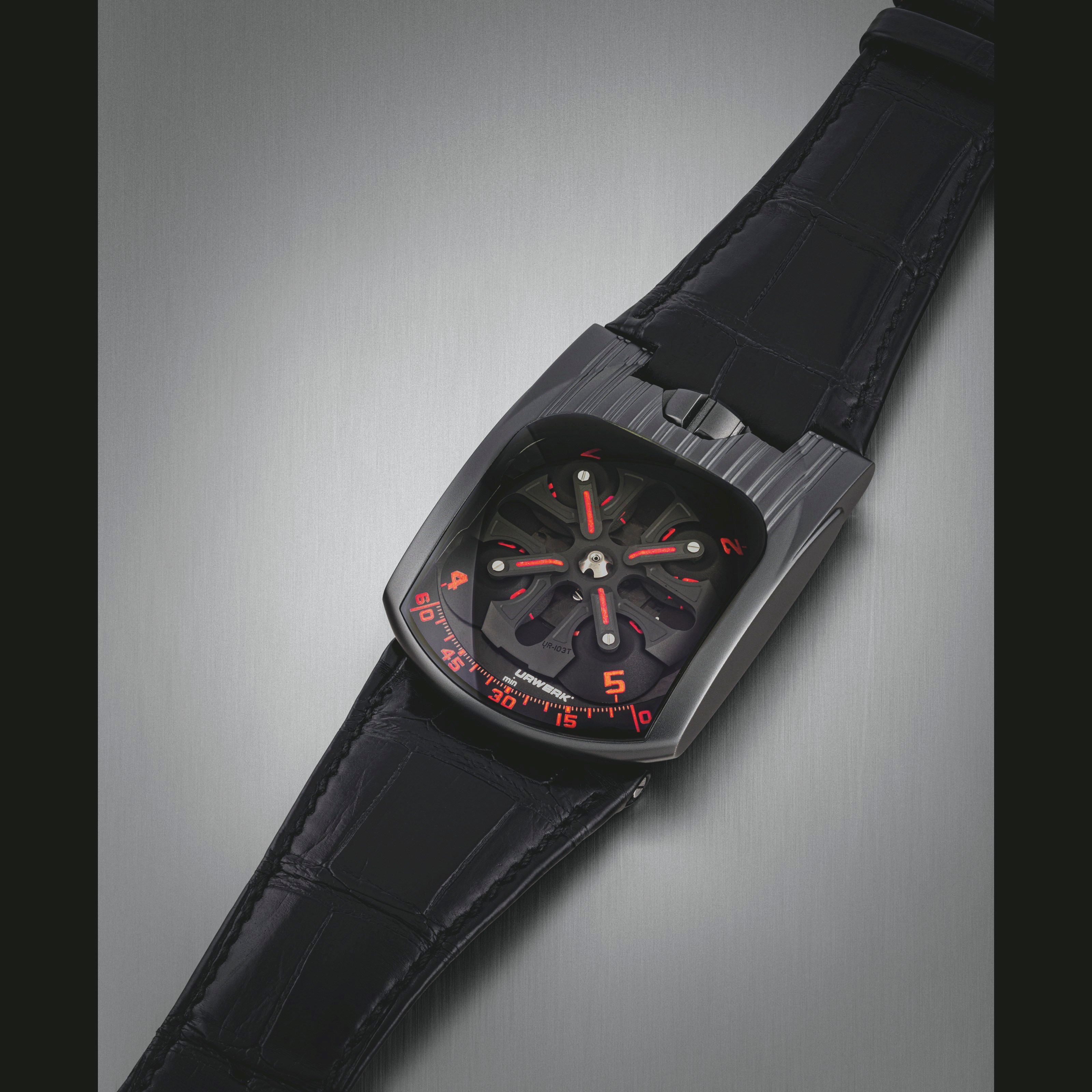 URWERK. AN ALTIN-COATED TITANIUM LIMITED EDITION WRISTWATCH WITH WANDERING HOUR DISPLAY AND POWER RESERVE