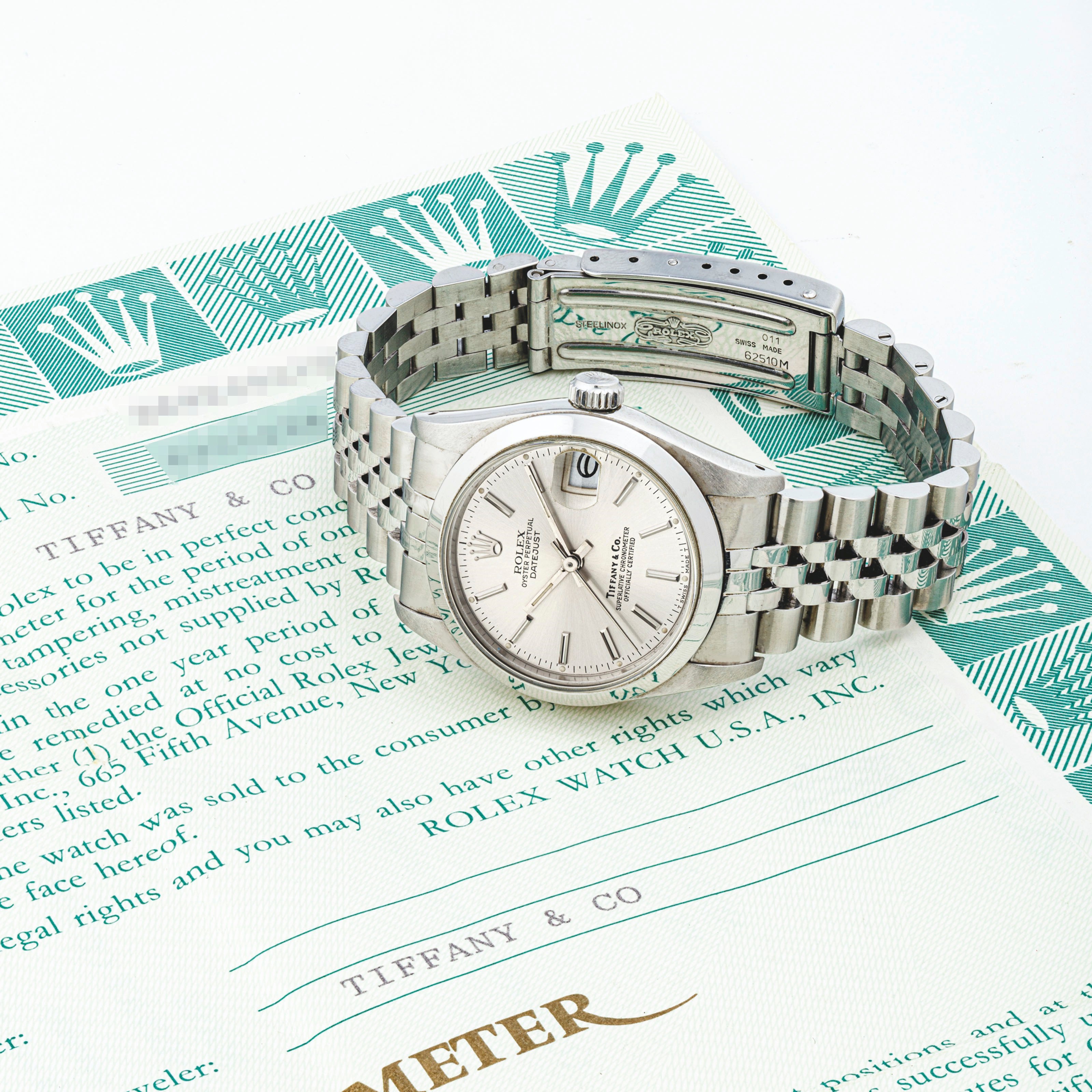 勞力士，不鏽鋼自動上弦鏈帶腕錶，配中心秒針及日曆顯示，DATEJUST，型號68240，由蒂芙尼銷售，約1990年製，附原廠證書、盒子及外包裝