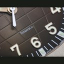 PATEK PHILIPPE. A STAINLESS STEEL AUTOMATIC WRISTWATCH WITH SWEEP CENTRE SECONDS AND DATE, RETAILED BY TIFFANY & CO.