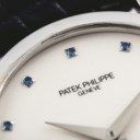 PATEK PHILIPPE. A FINE PLATINUM AND SAPPHIRE-SET WRISTWATCH