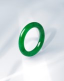 AN EXCEPTIONAL JADEITE BANGLE